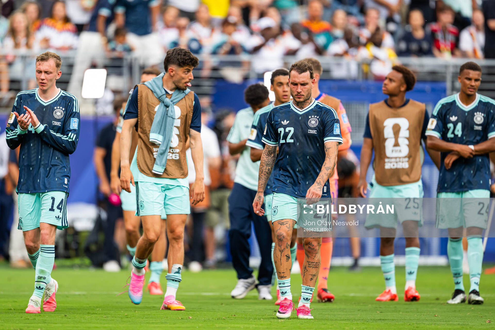Maximilian Beier and David Raum of Germany look dejected