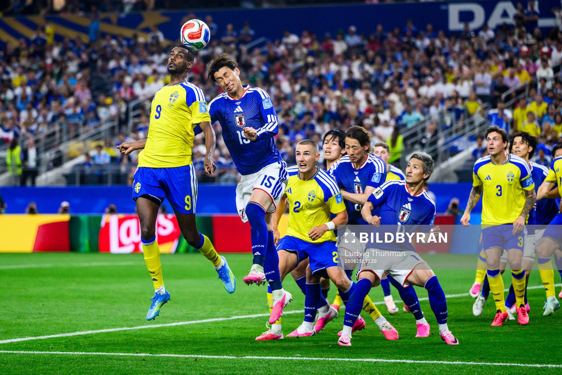 Alexander Isak of Sweden and Daichi Kamada of Japan