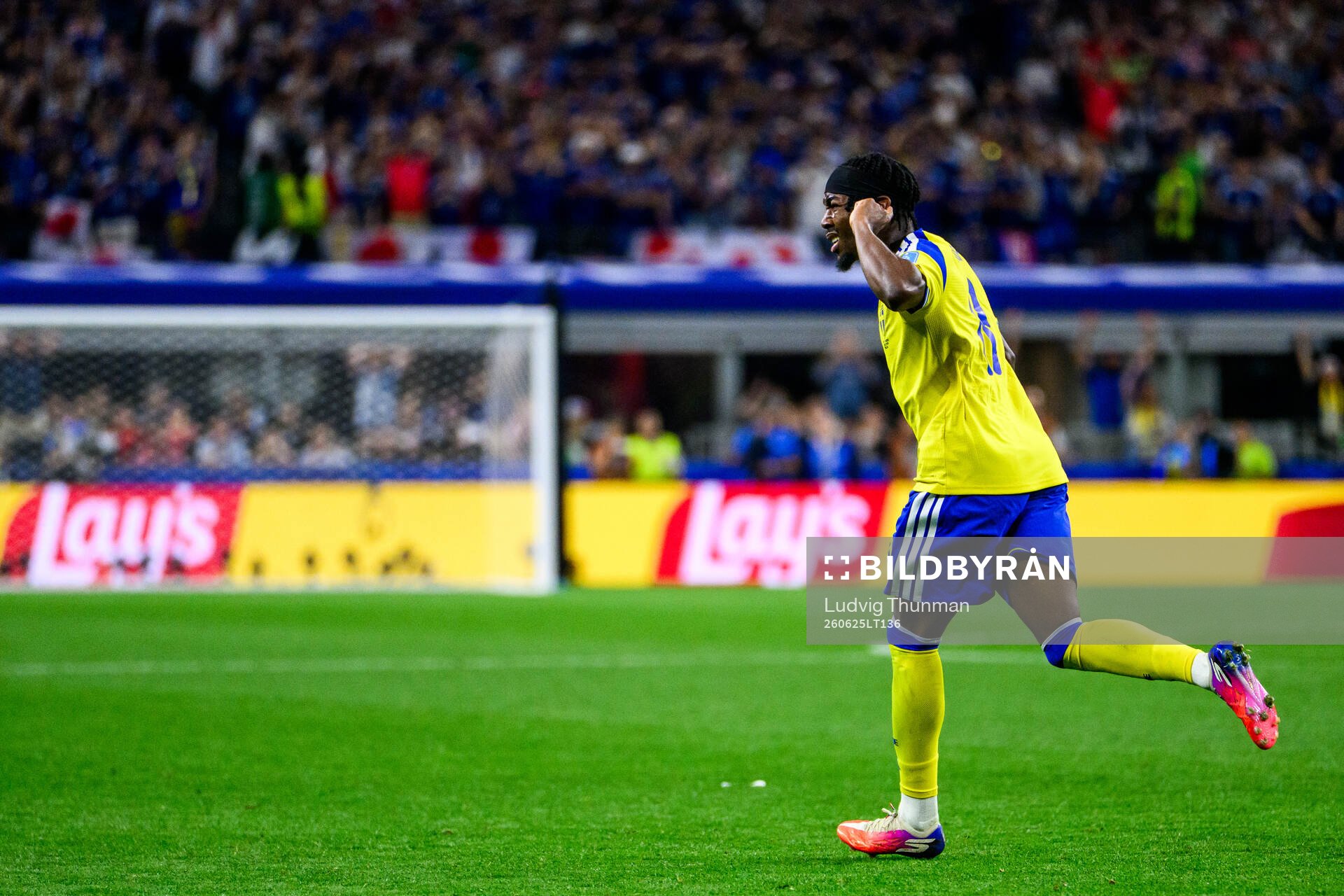 Anthony Elanga of Sweden celebrates scoring 1-1