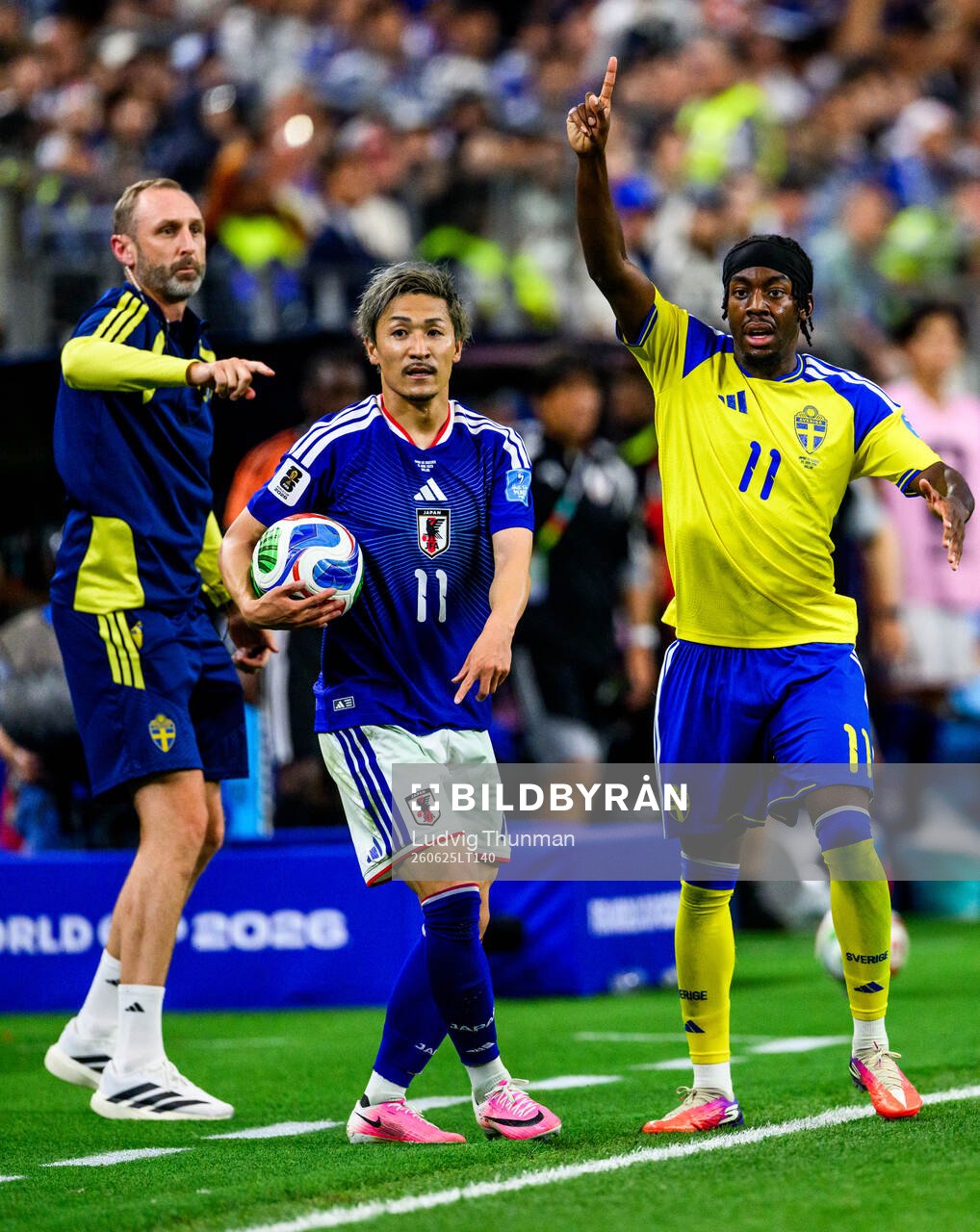 Daizen Maeda of Japan and Anthony Elanga of Sweden