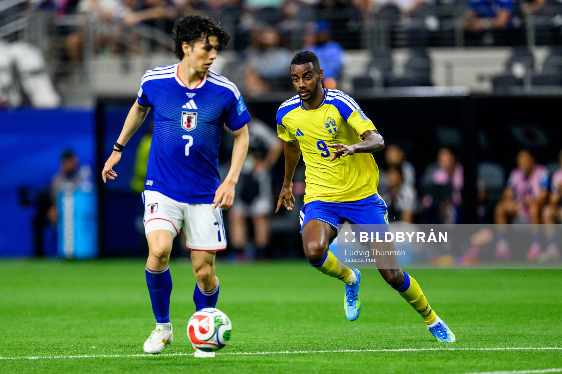 Ao Tanaka of Japan and Alexander Isak of Sweden