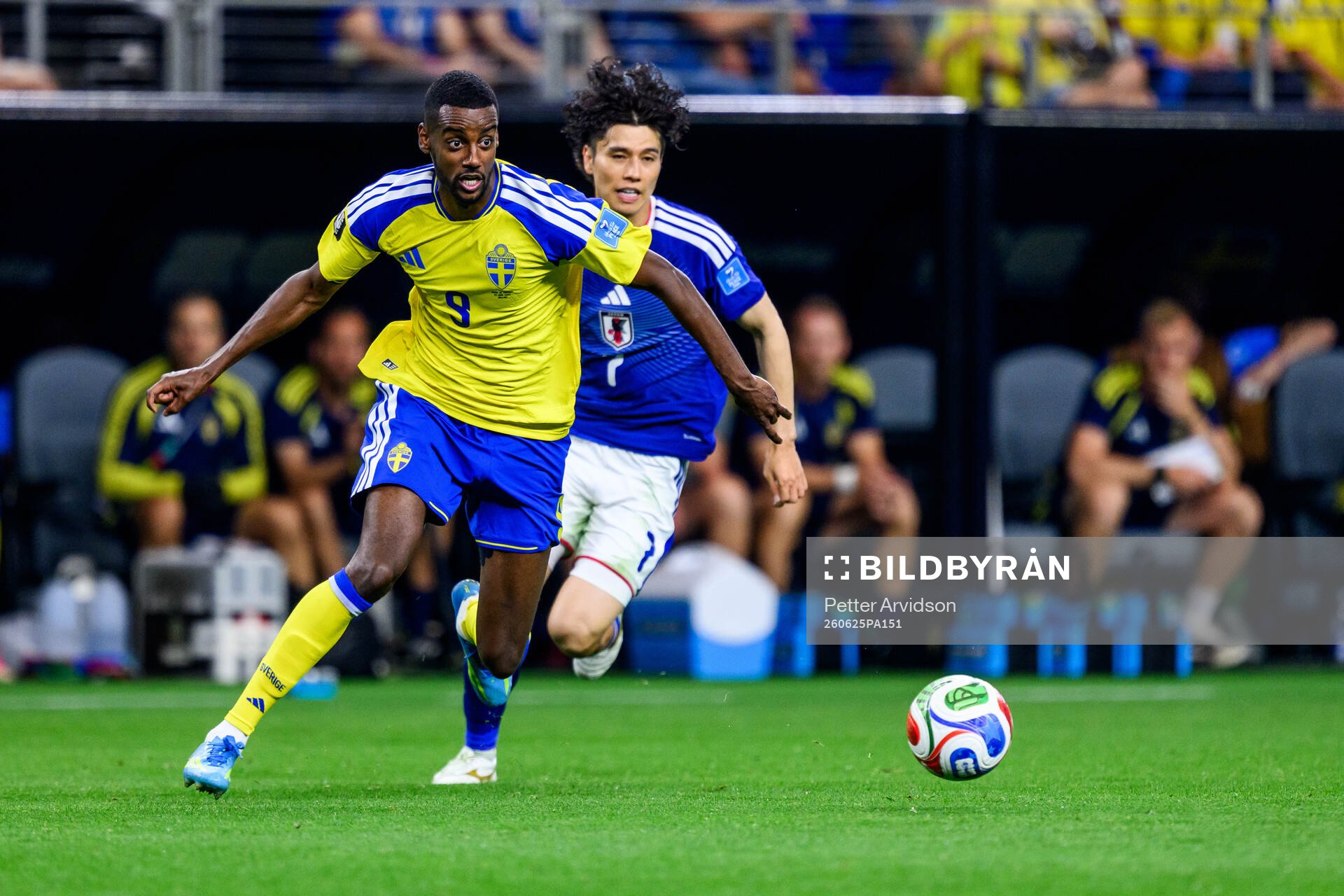 Alexander Isak of Sweden and Ao Tanaka of Japan
