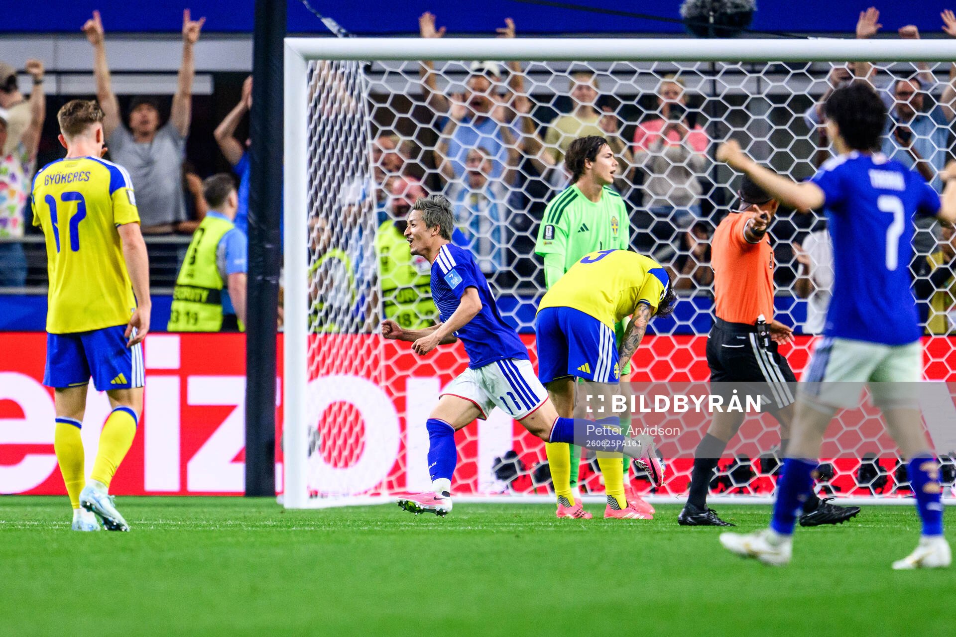 Daizen Maeda of Japan celebrates 1-0