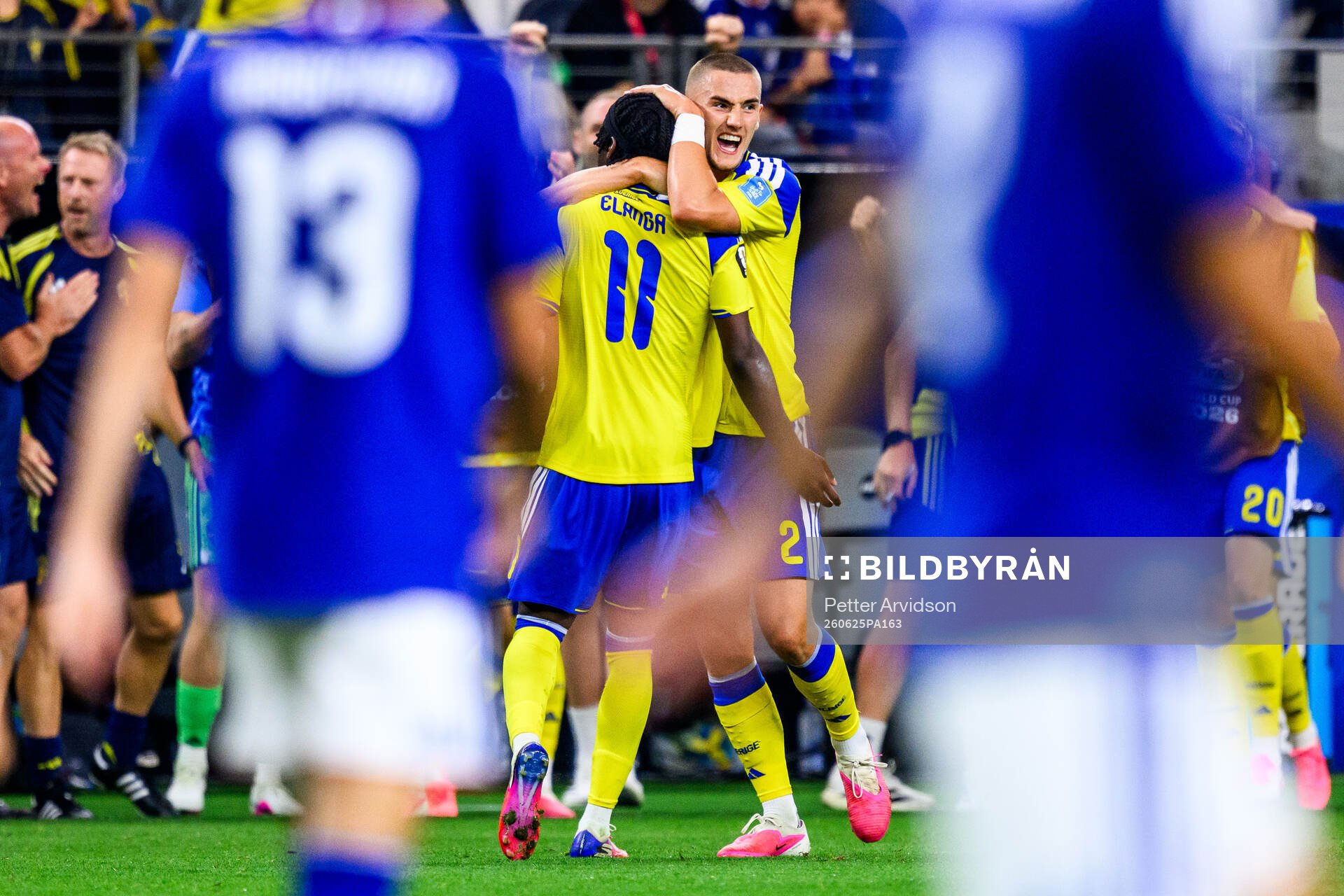 Gustaf Lagerbielke and Anthony Elanga of Sweden celebrate