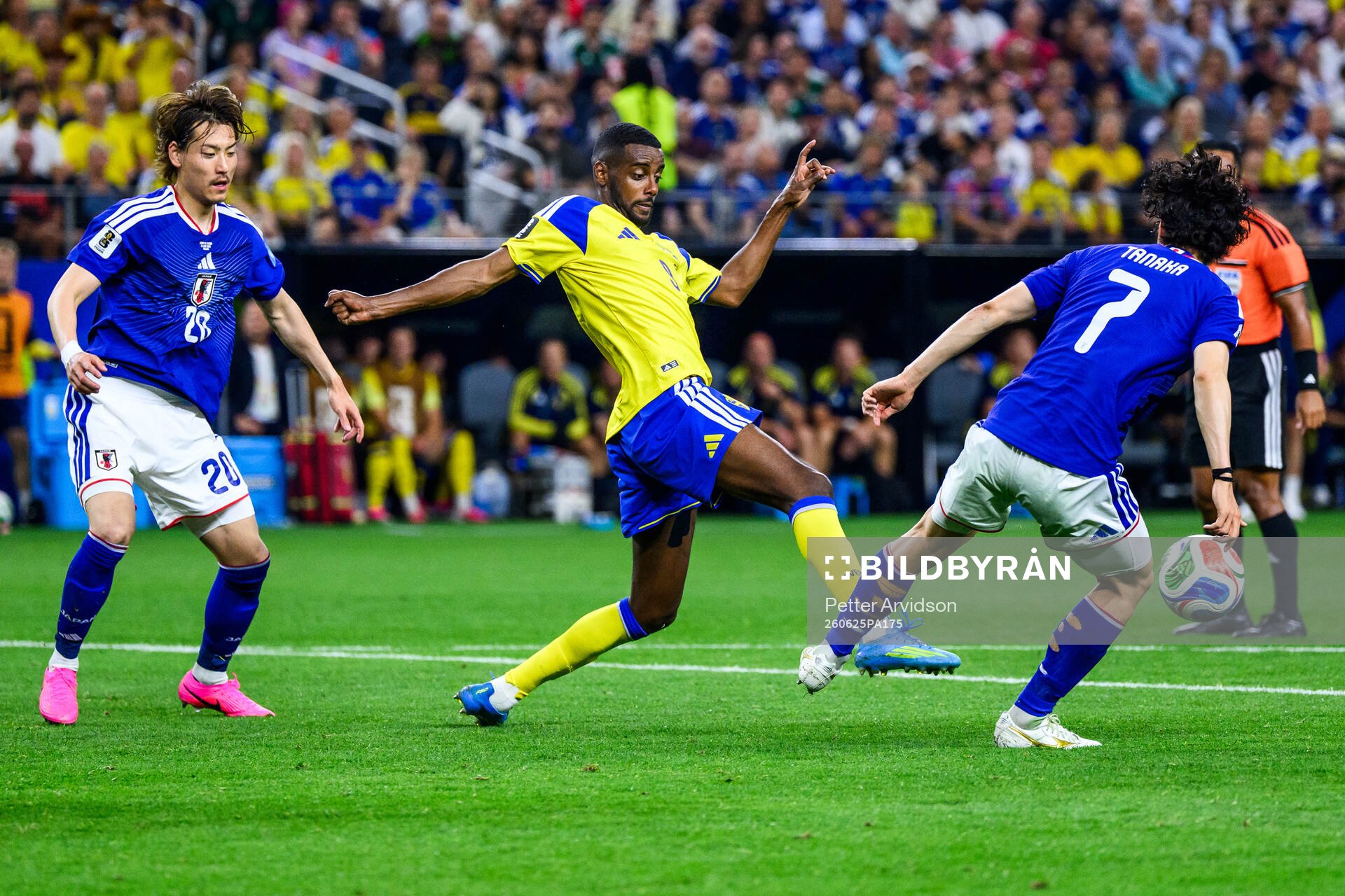 Alexander Isak of Sweden and Ao Tanaka of Japan