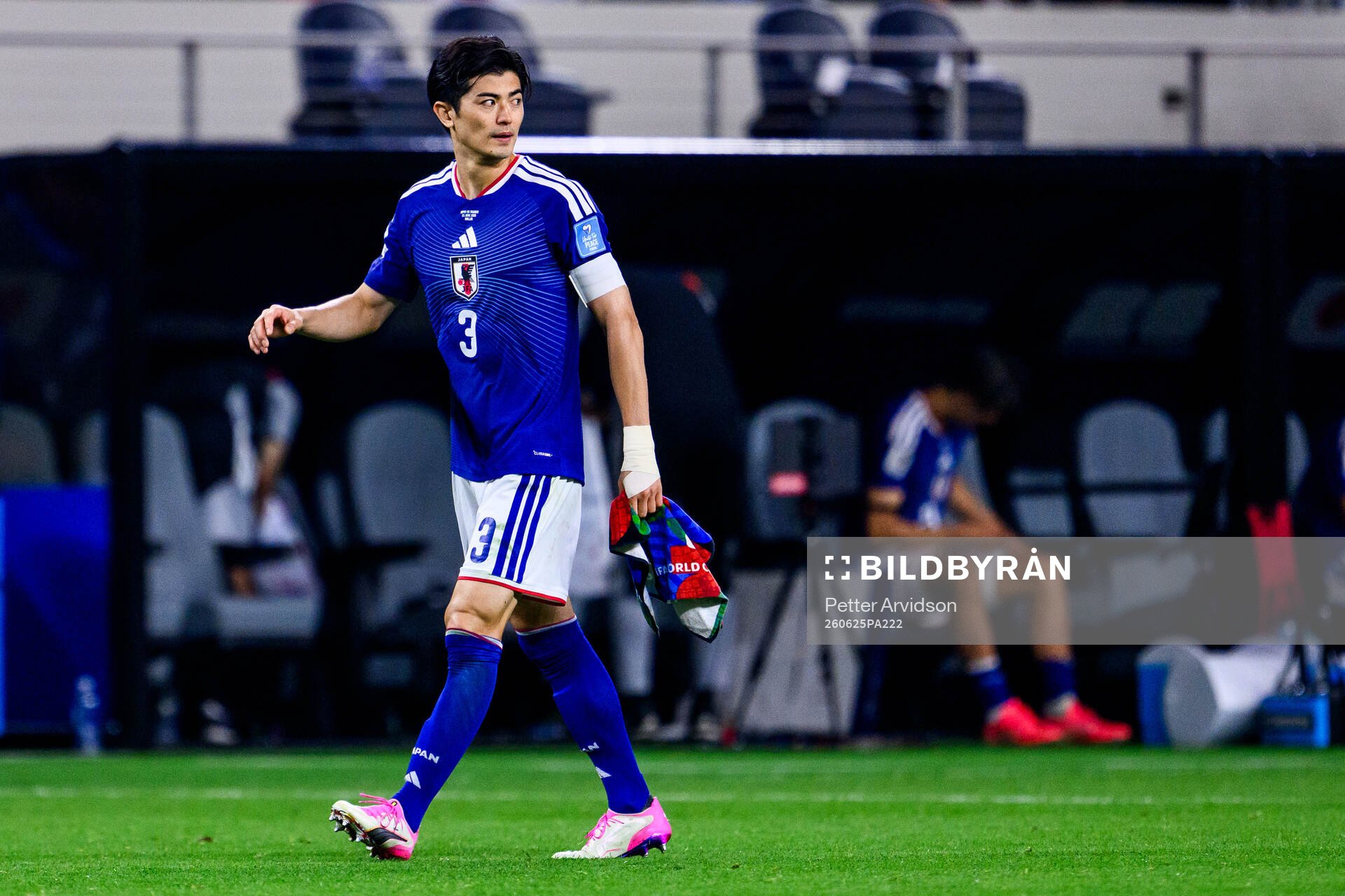 Shogo Taniguchi of Japan looks dejected