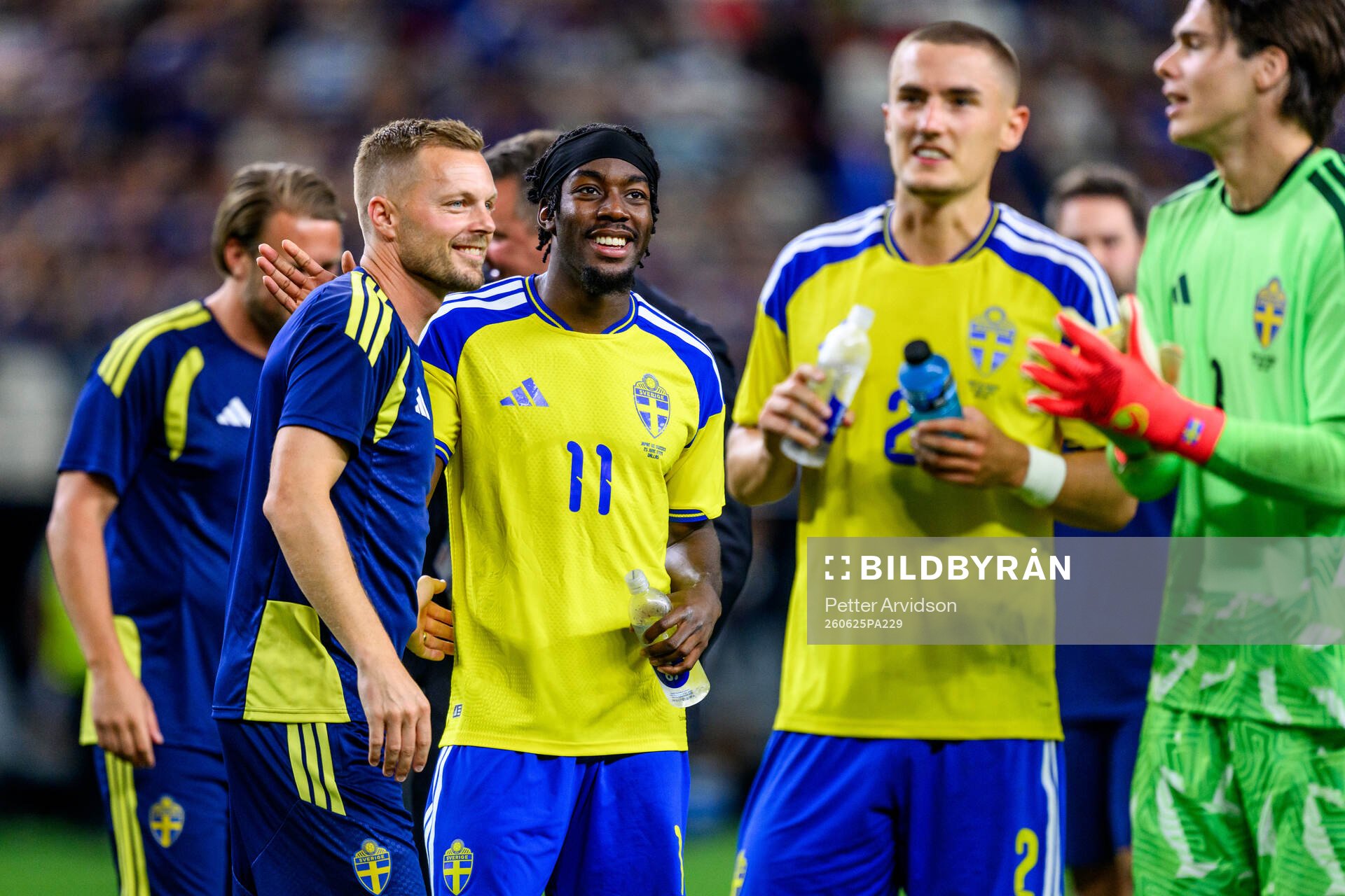 Assistant coach Sebastian Larsson and Anthony Elanga of