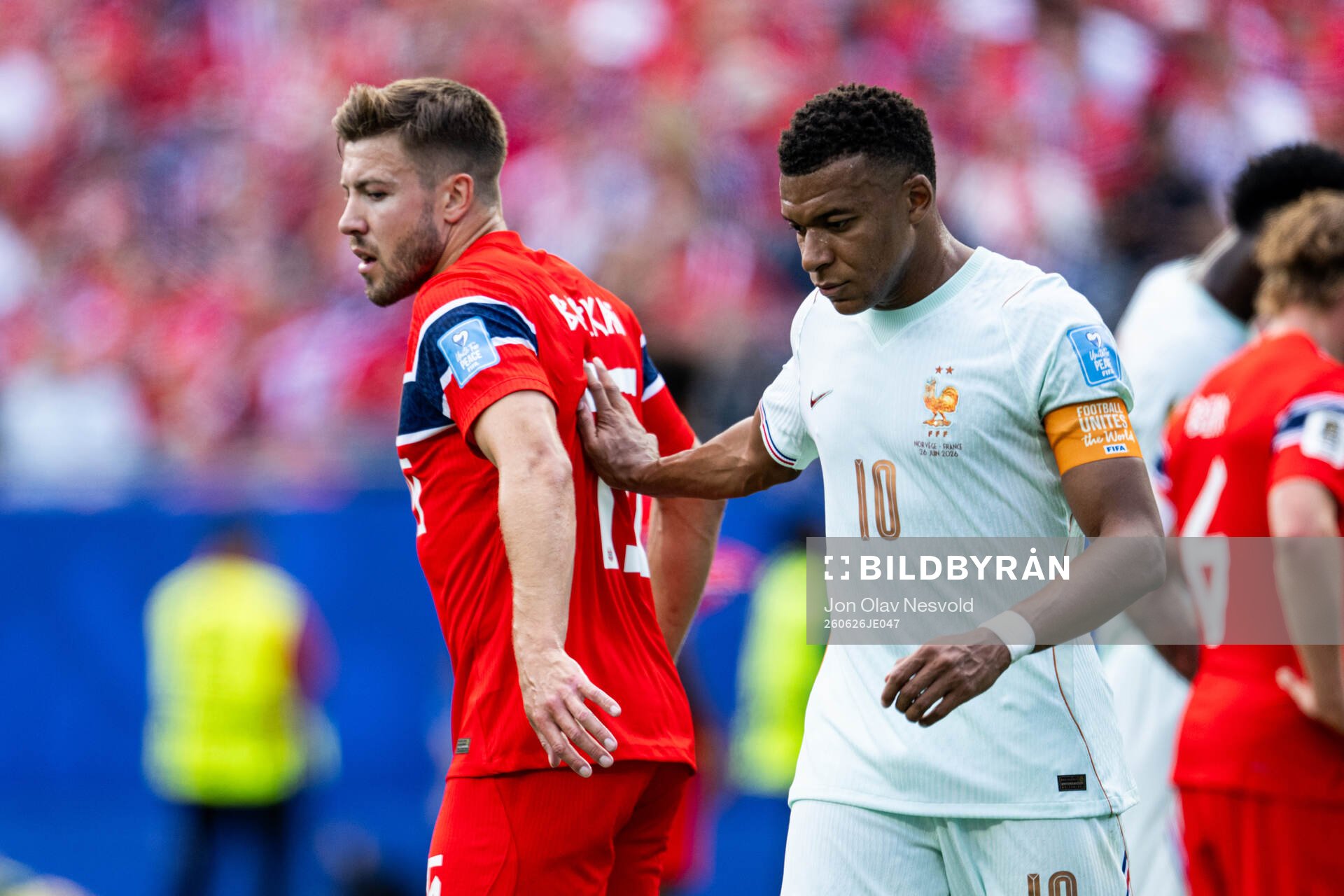 Fredrik André Bjørkan of Norway and Kylian Mbappe of