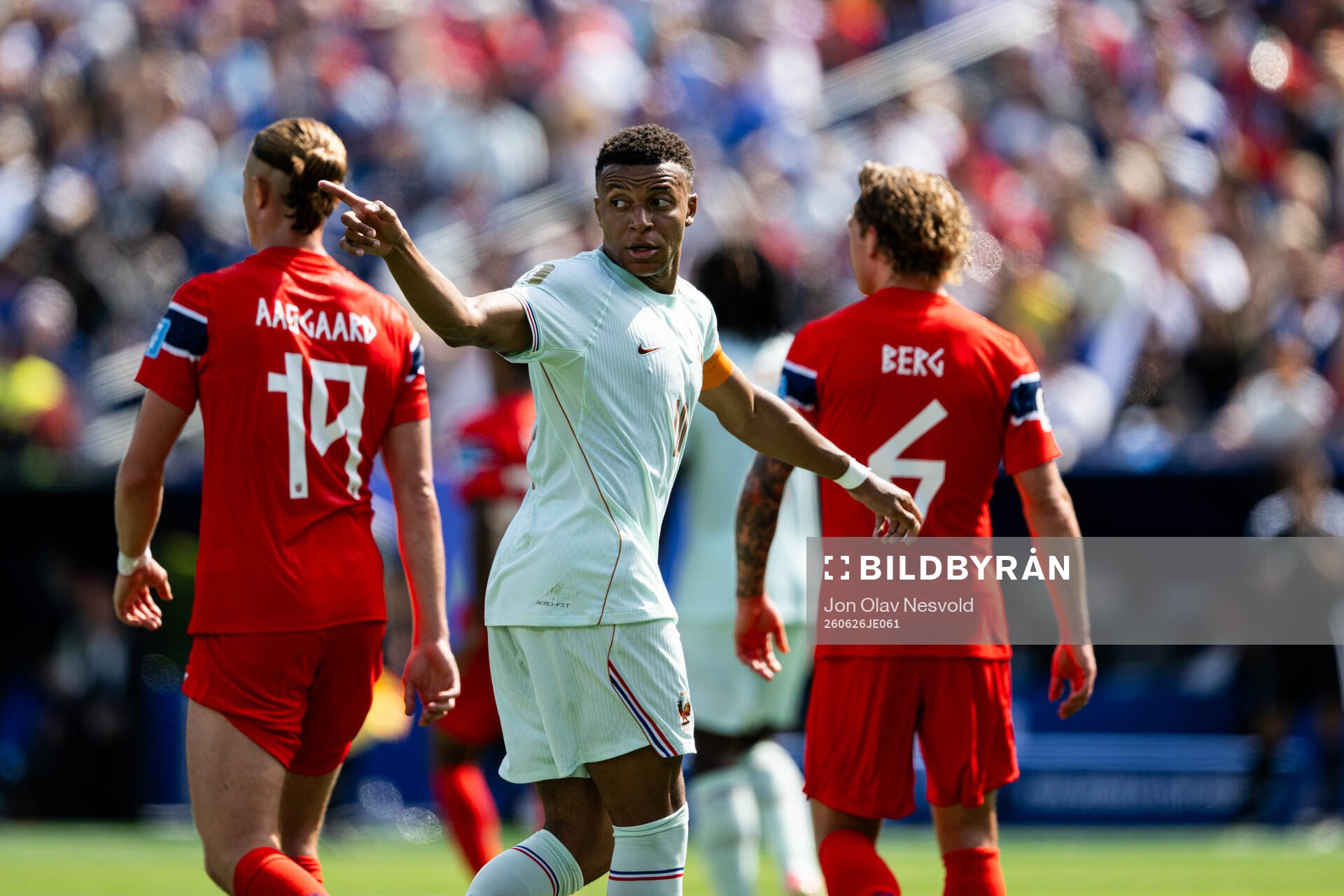 Thelo Aasgaard of Norway, Kylian Mbappe of France and
