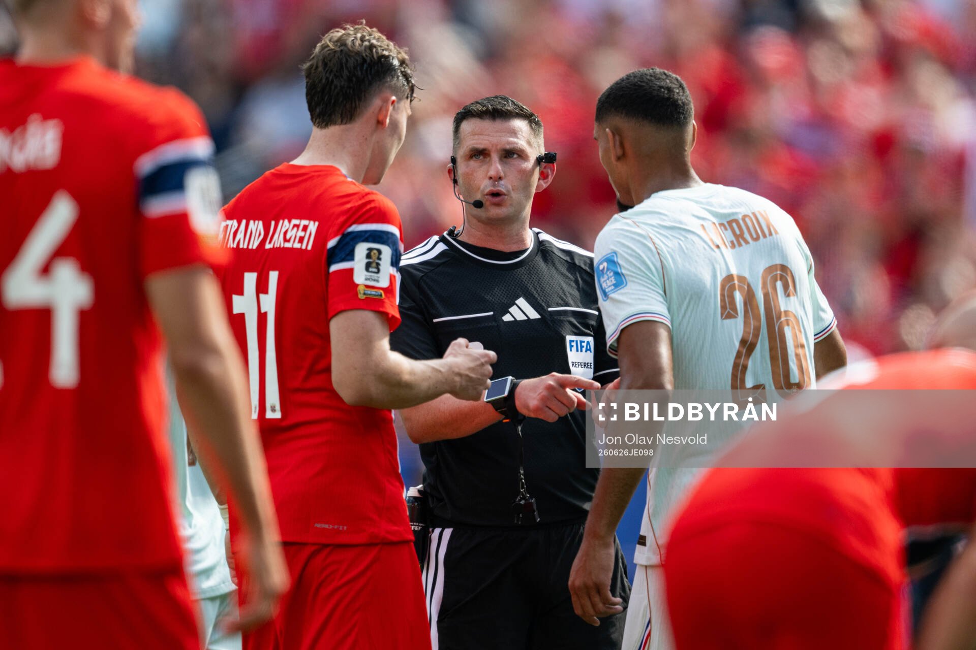 Jørgen Strand Larsen of Norway, Referee Michael Oliver and