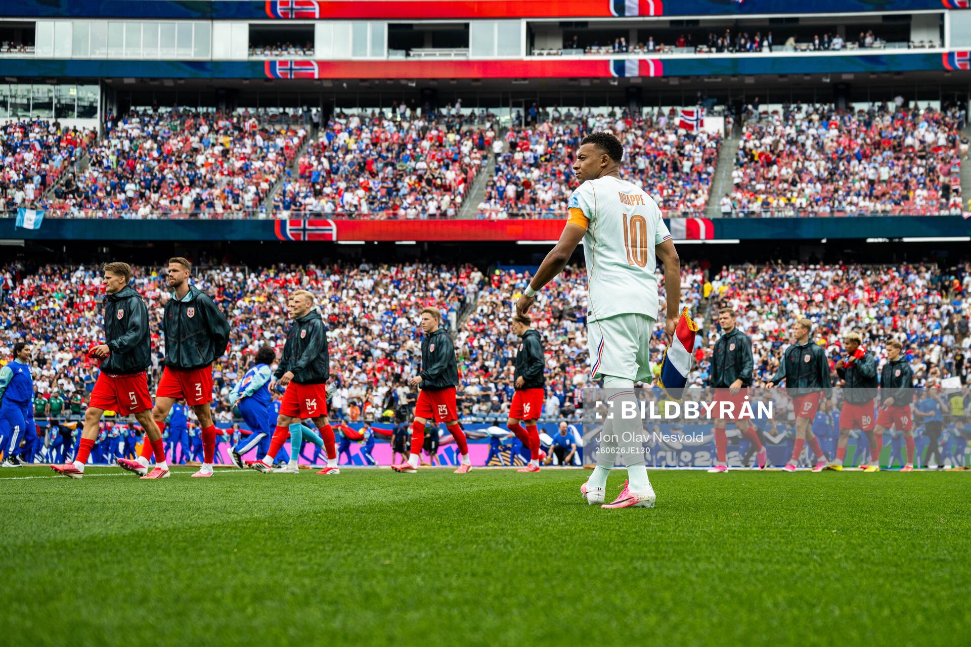 Kylian Mbappe of France and players of Norway