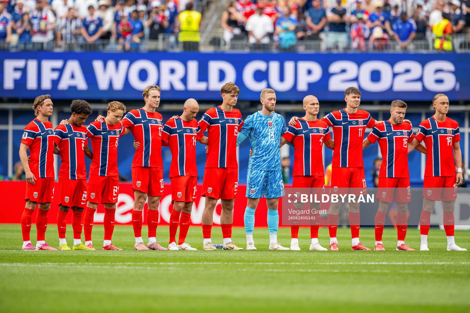 Players of Norway line up for a minute of silence