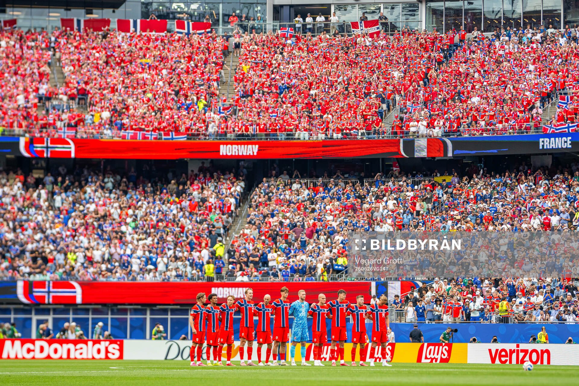 Players of Norway line up for a minute of silence