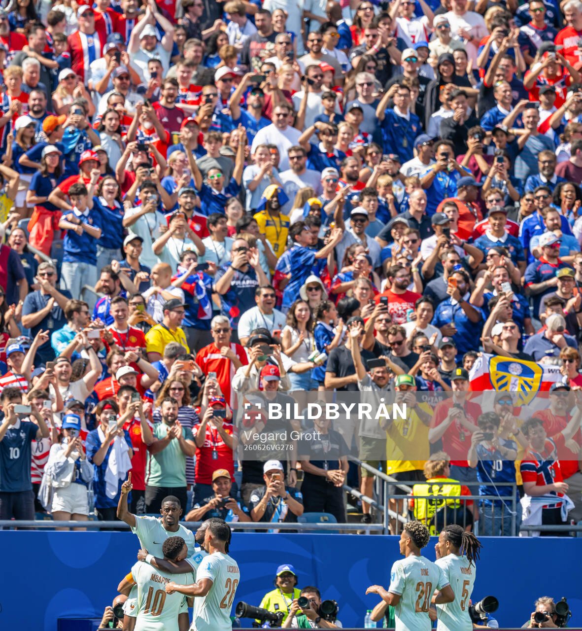 Ousmane Dembele of France celebrates with Kylian Mbappe and