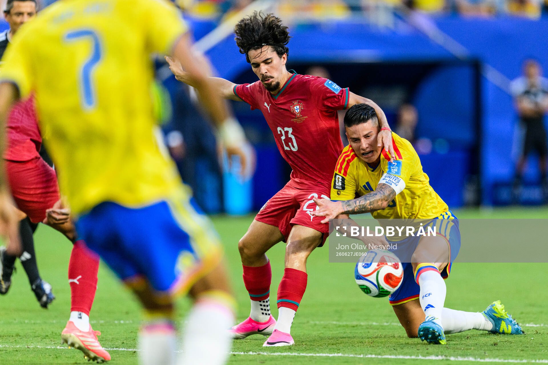 Vitinha of Portugal and James Rodriguez of Colombia