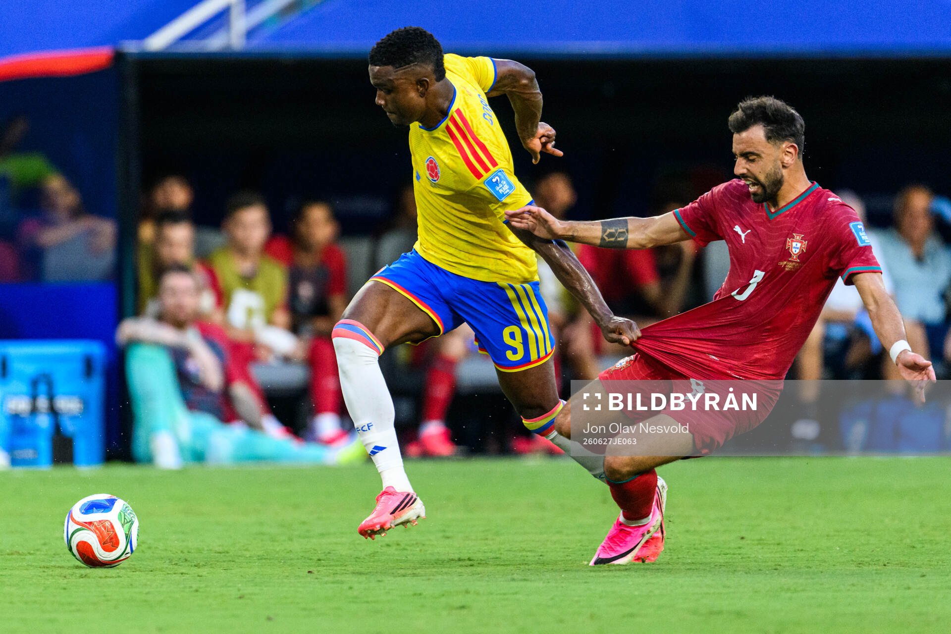 Jhon Cordoba of Colombia and Bruno Fernandes of Portugal