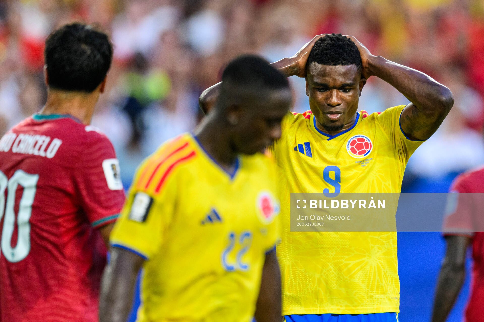Jhon Cordoba of Colombia looks dejected