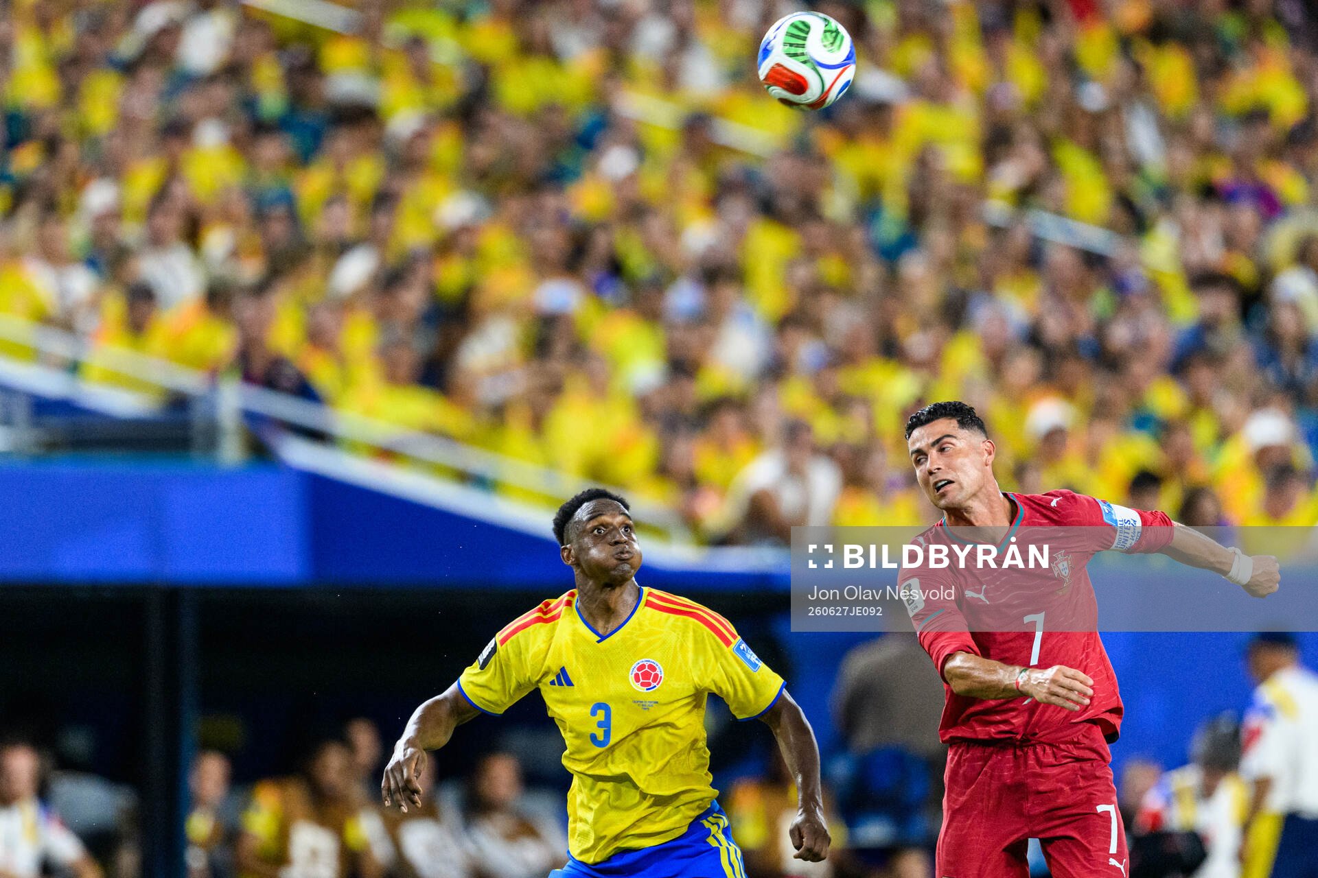 Jhon Lucumi of Colombia and Cristiano Ronaldo of Portugal