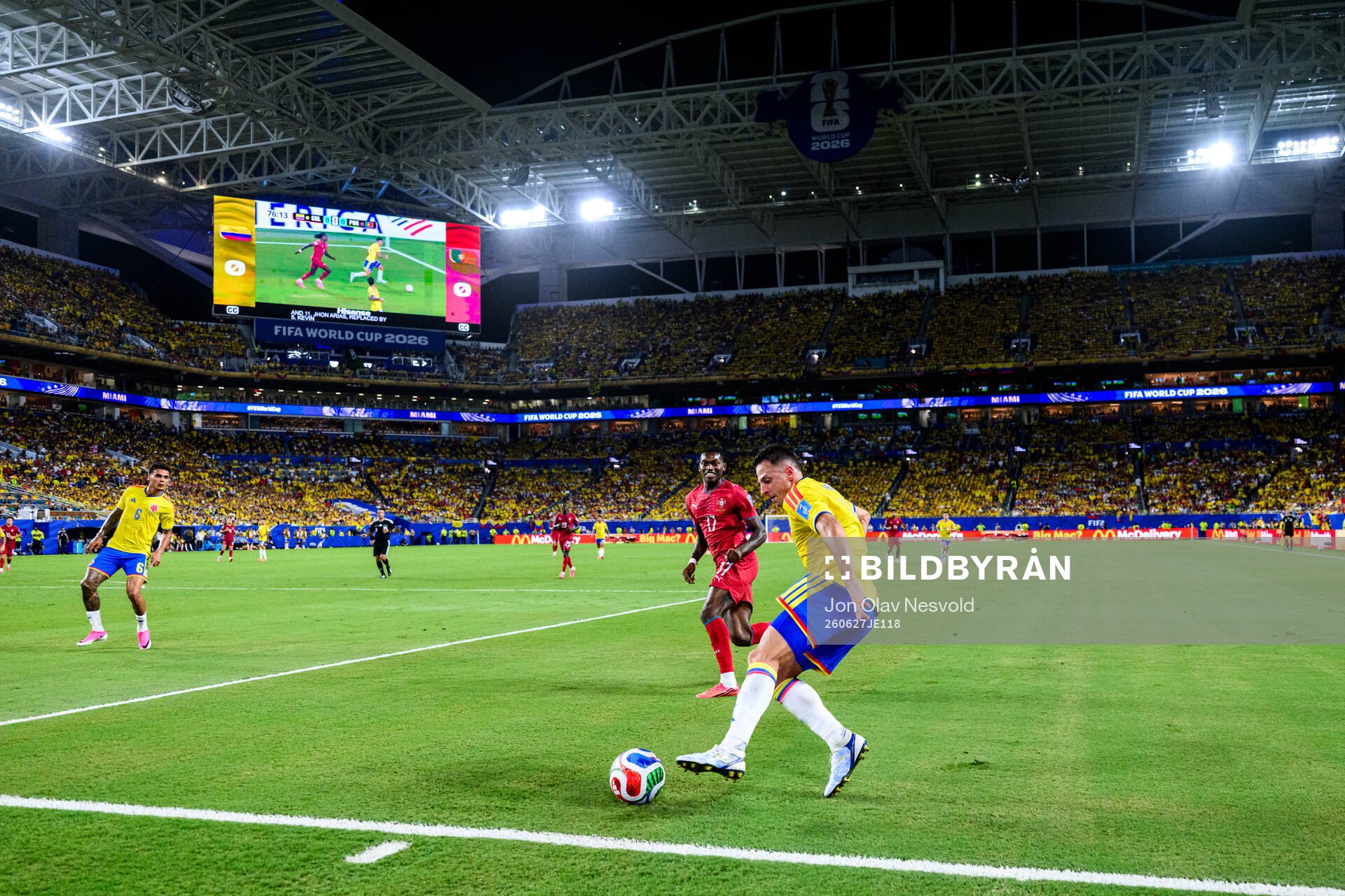 Rafael Leao of Portugal and Santiago Arias of Colombia