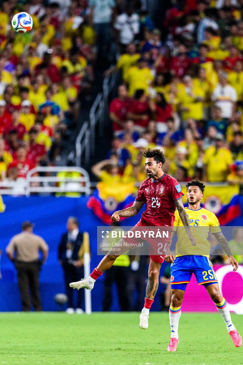 Samu Costa of Portugal and Luis Suarez of Colombia