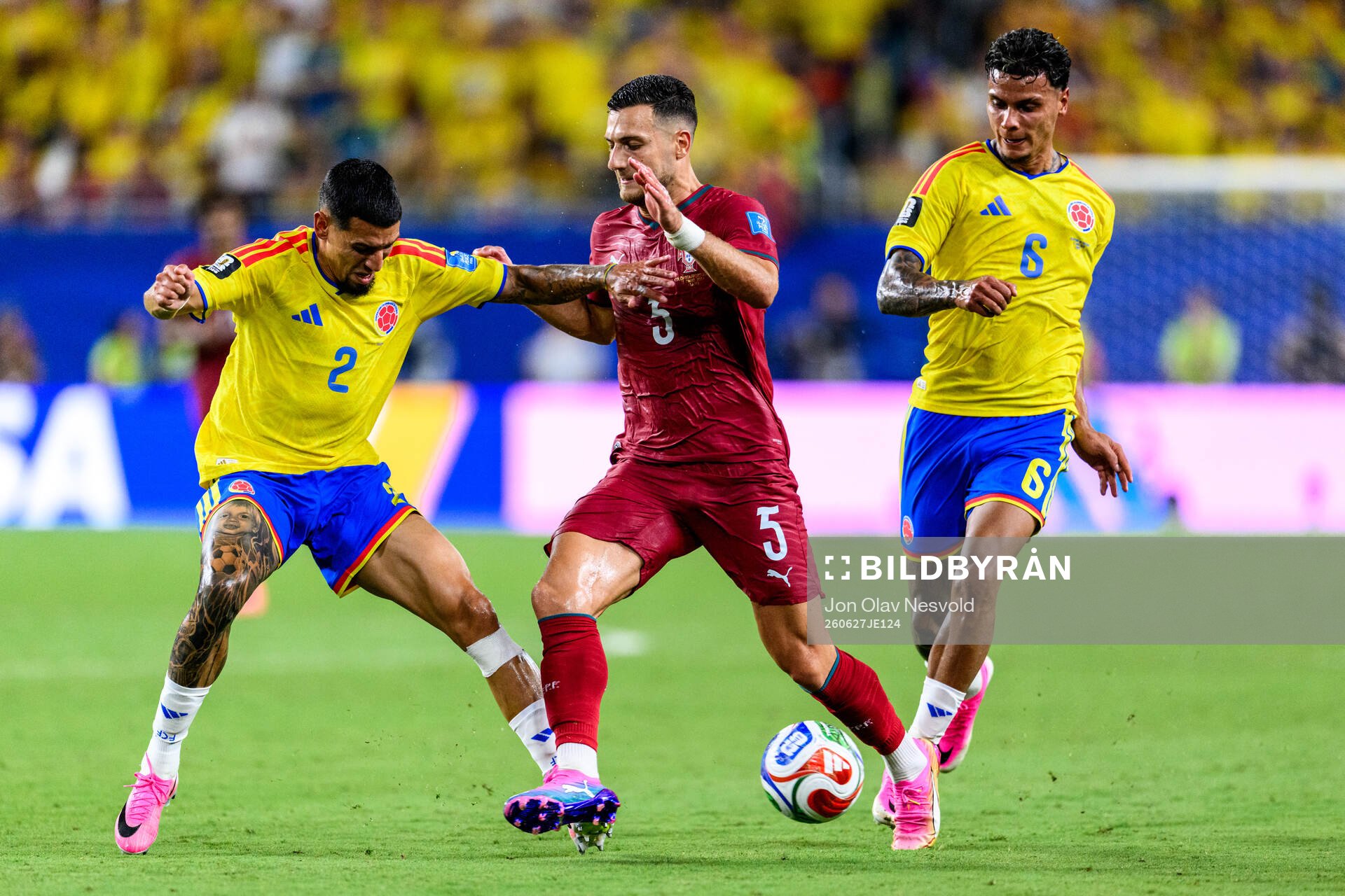 Daniel Munoz and Richard Rios of Colombia and Diogo Dalot