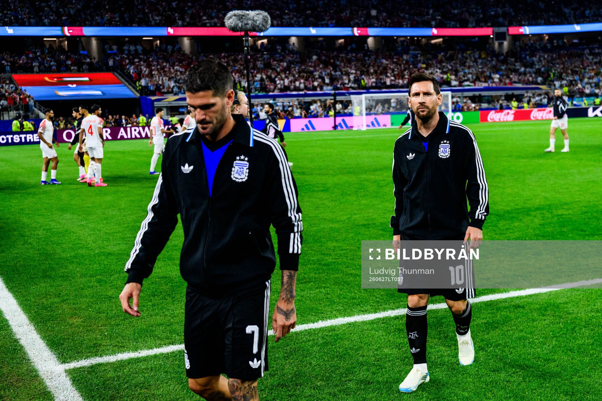 Rodrigo De Paul and Lionel Messi of Argentina