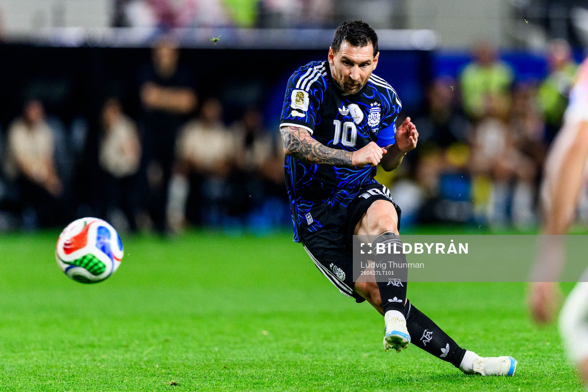 Lionel Messi of Argentina scores the 1-3 goal