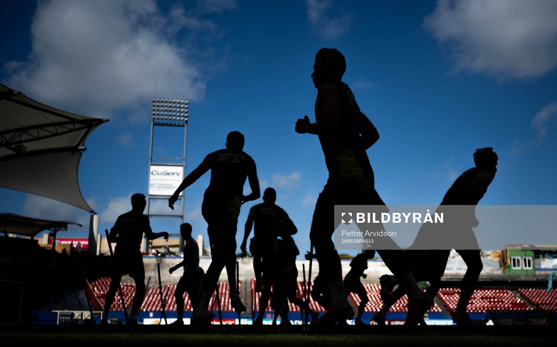 Players of the Swedish national football team in silhouette