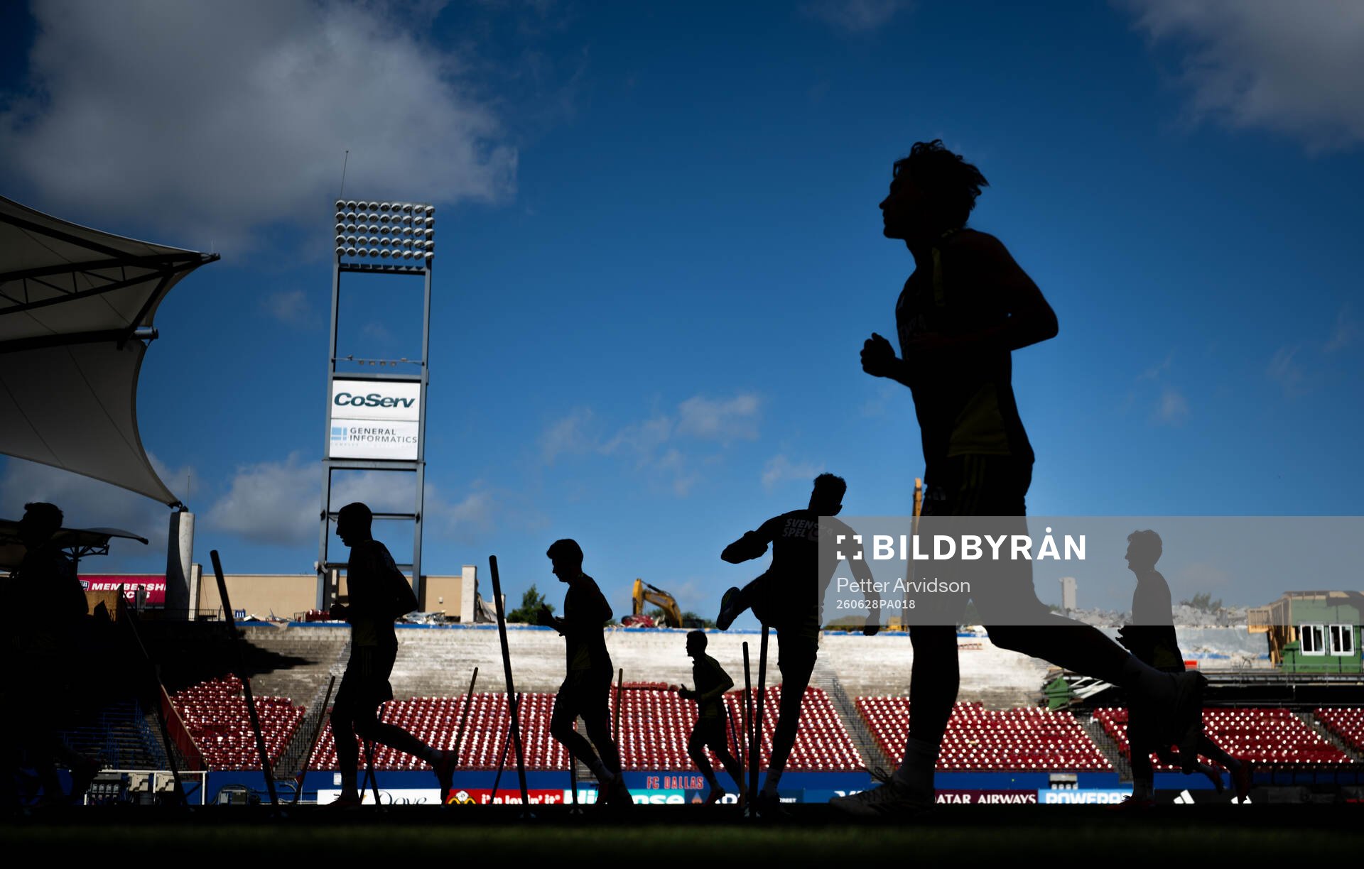 Players of the Swedish national football team in silhouette