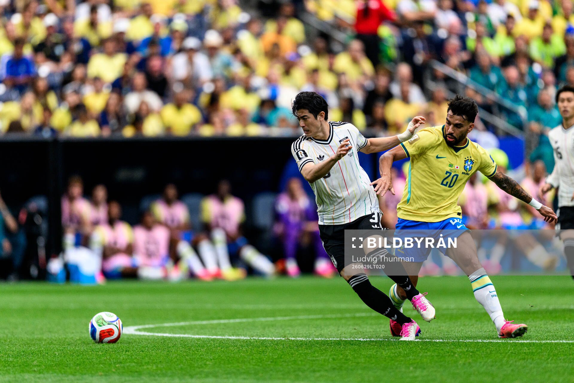 Shogo Taniguchi of Japan and Lucas Paqueta of Brazil