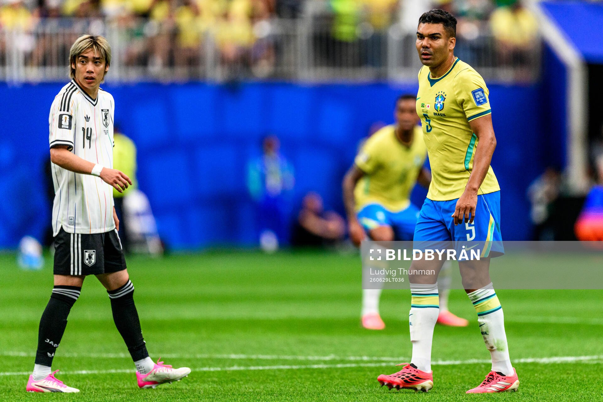 Junya Ito of Japan and Casemiro of Brazil
