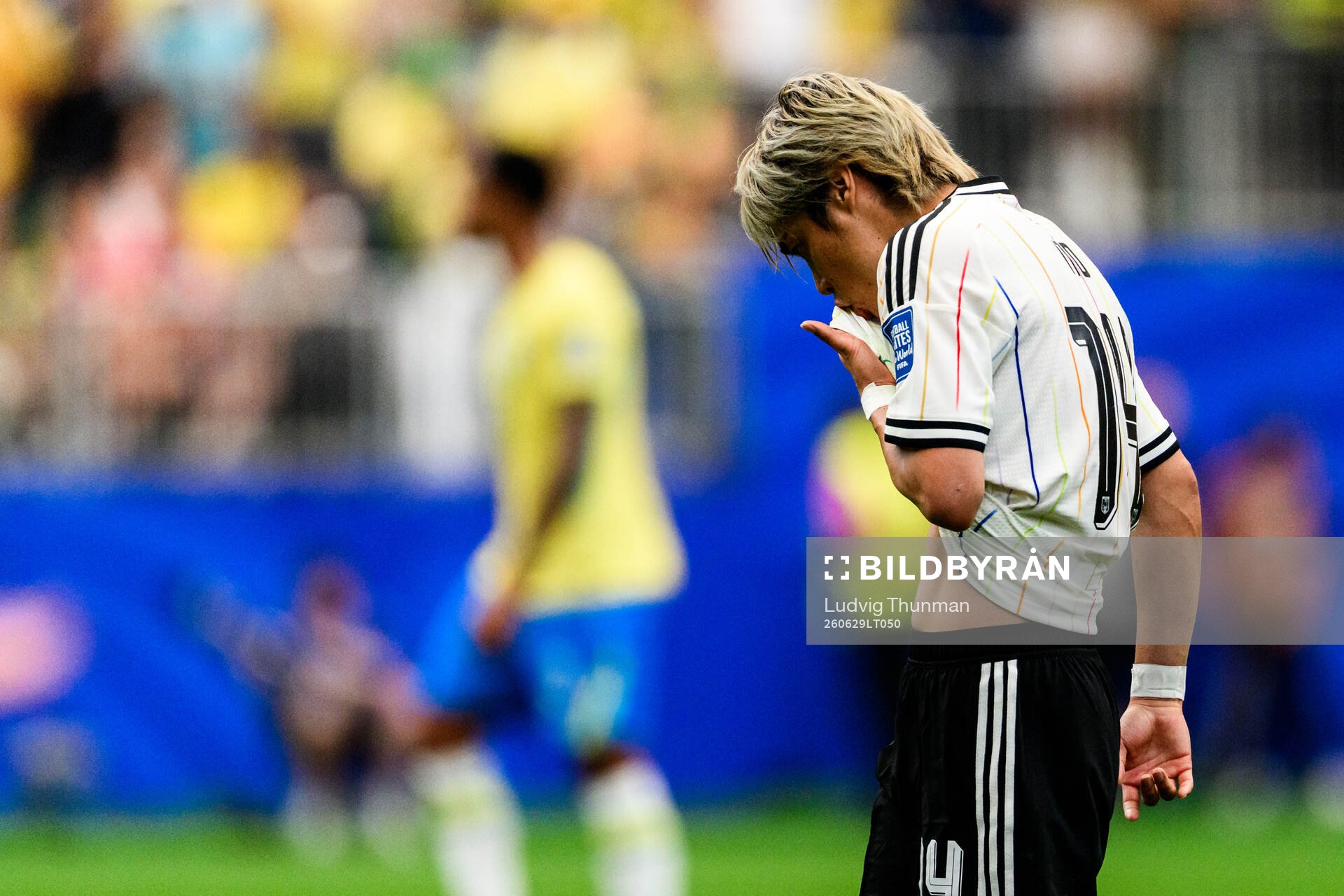 Junya Ito of Japan looks dejected