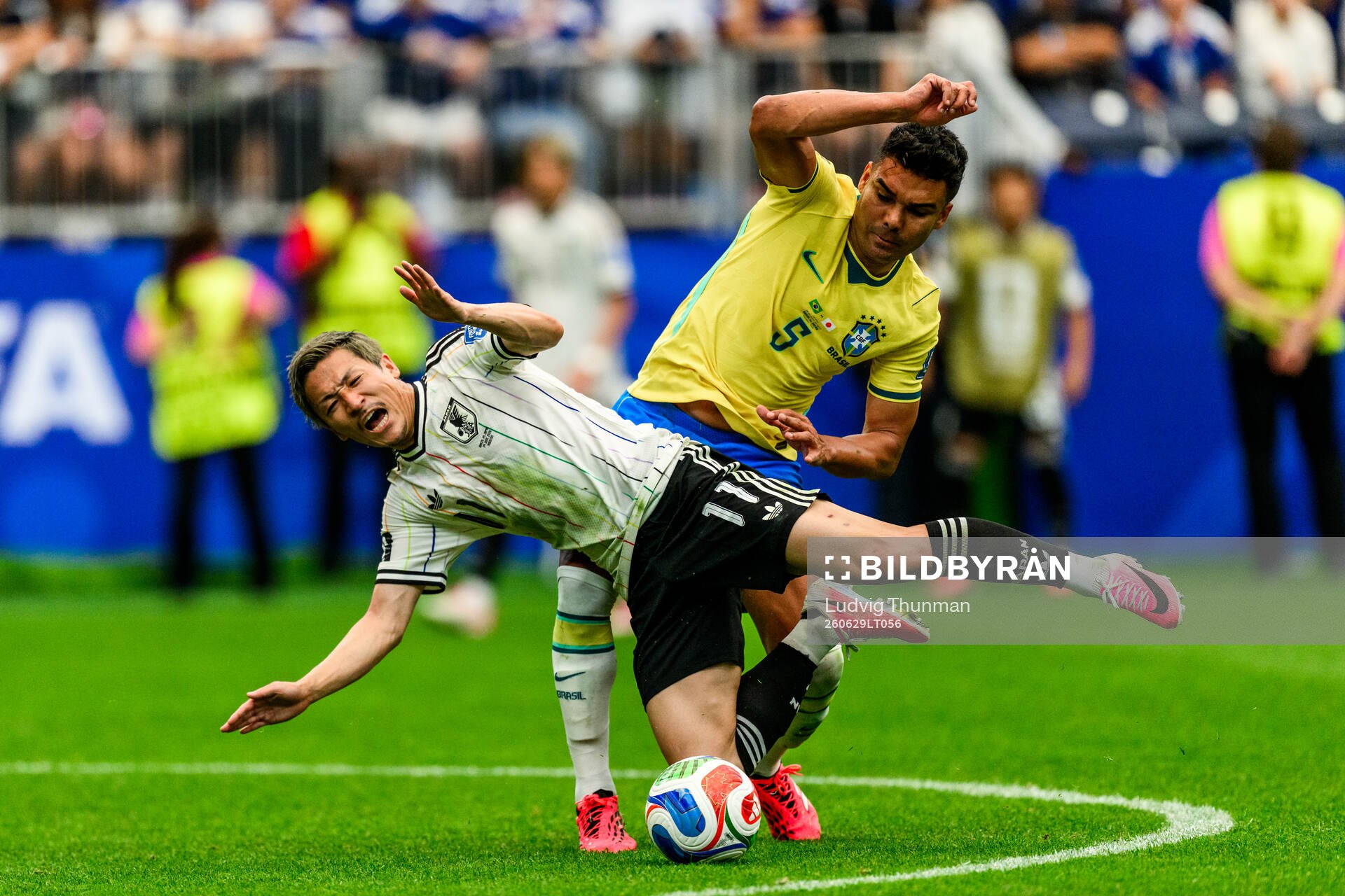 Daizen Maeda of Japan and Casemiro of Brazil