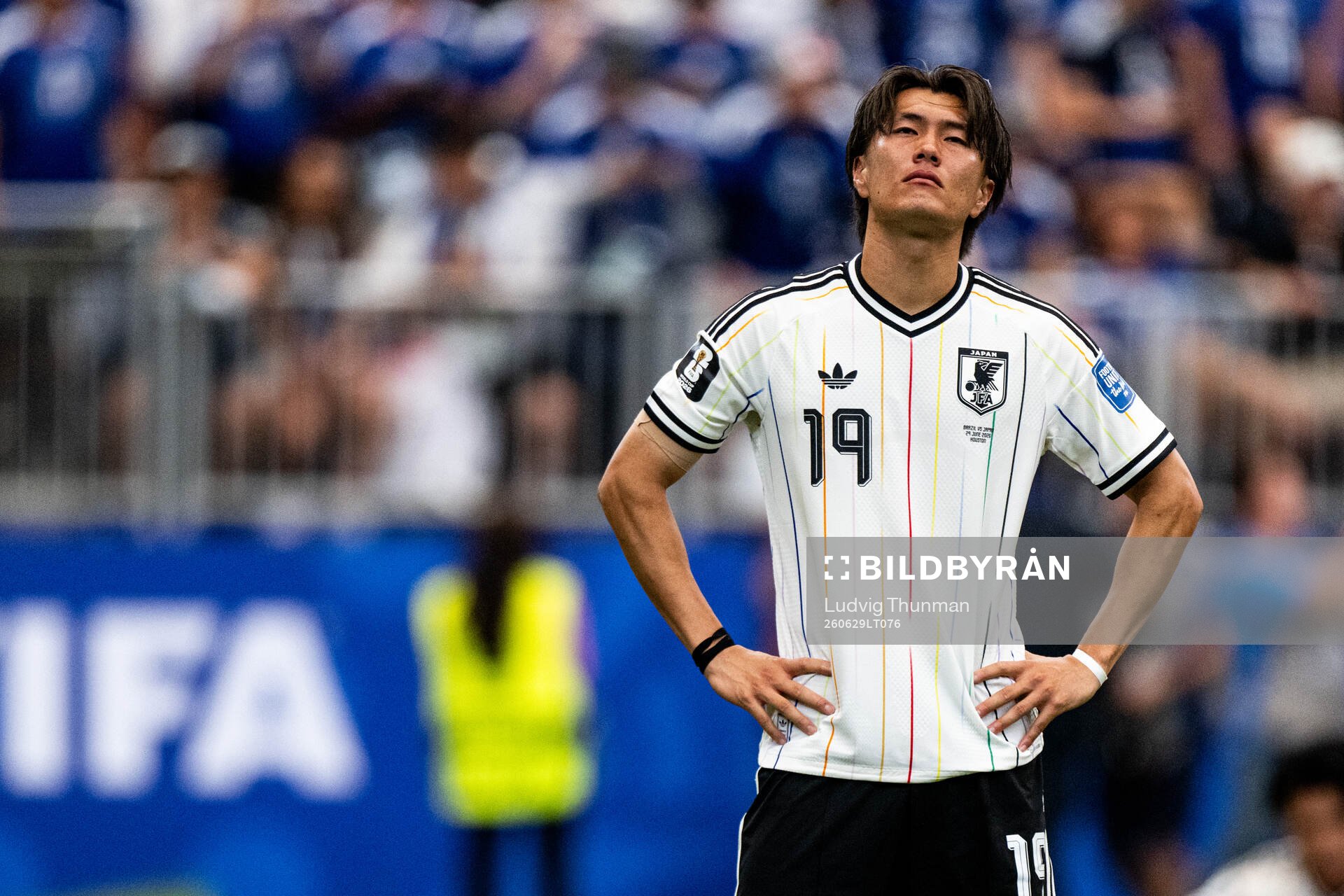 Koki Ogawa of Japan looks dejected
