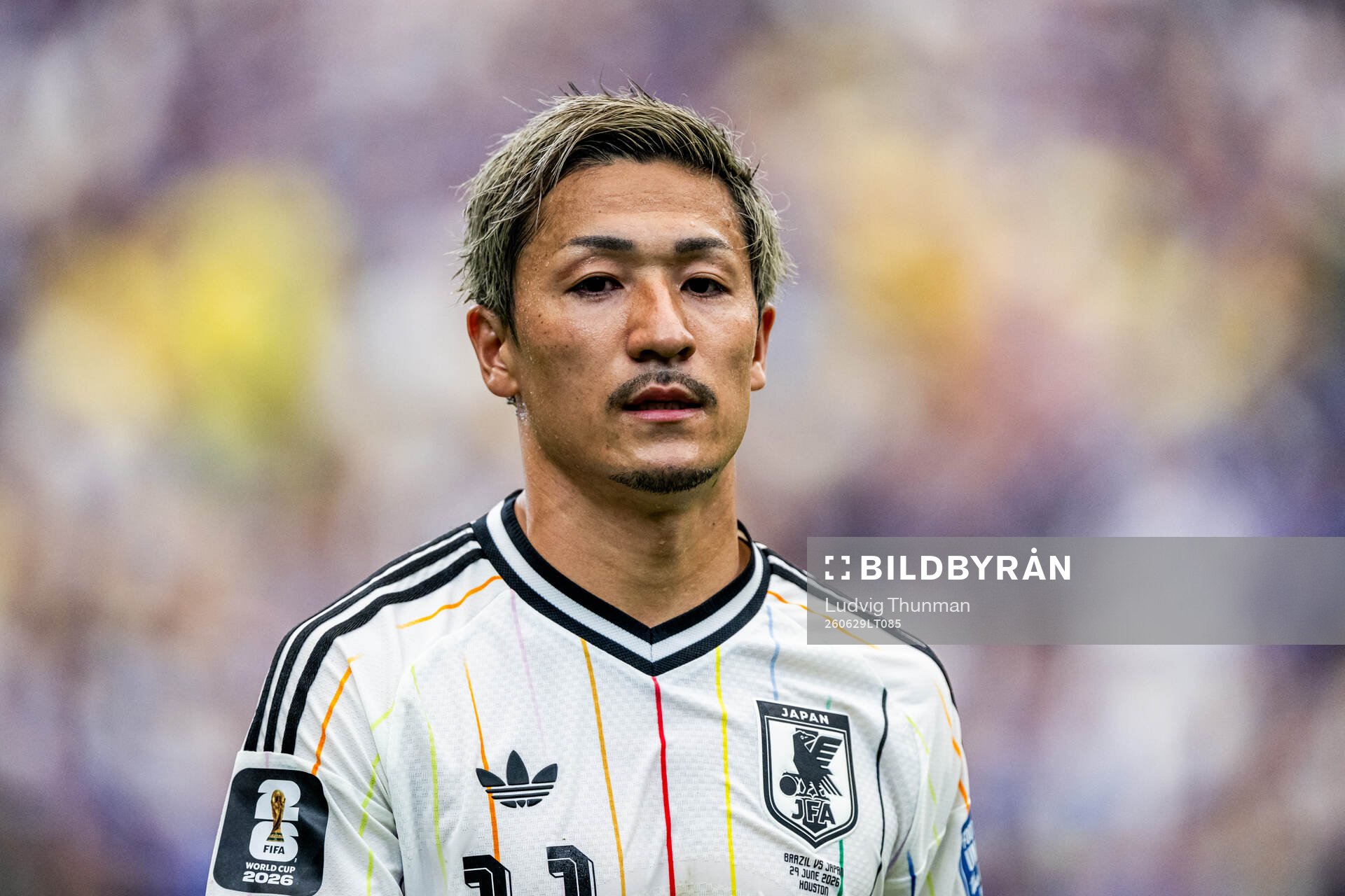 Daizen Maeda of Japan looks dejected