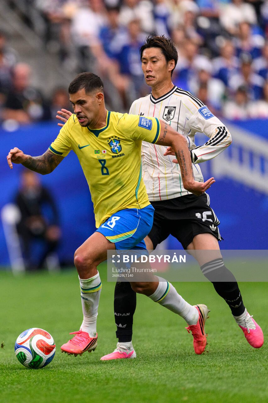 Bruno Guimaraes of Brazil and Daichi Kamada of Japan