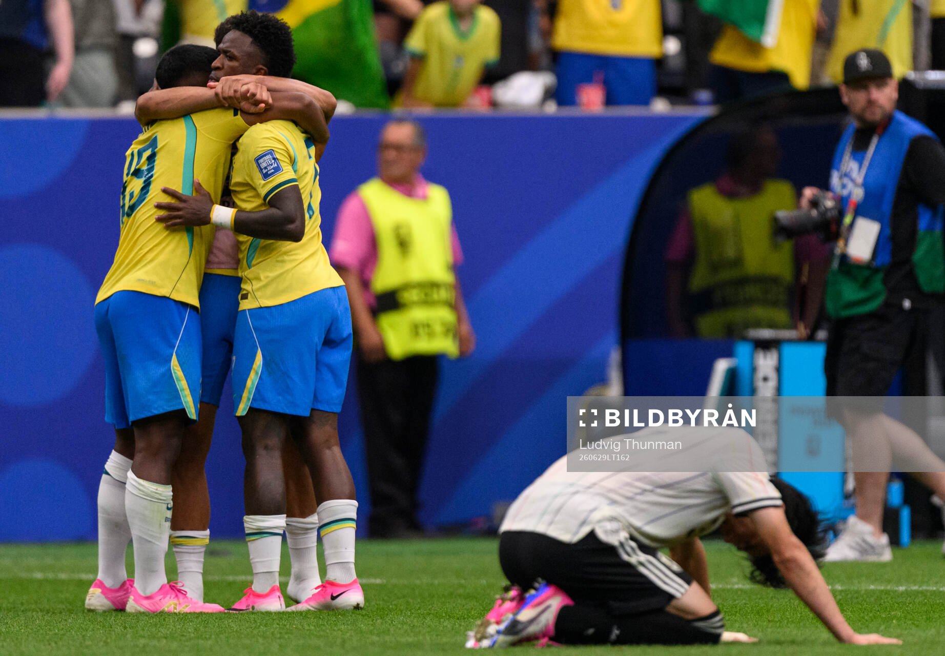 Endrick and Vinicius Junior of Brazil celebrates while a