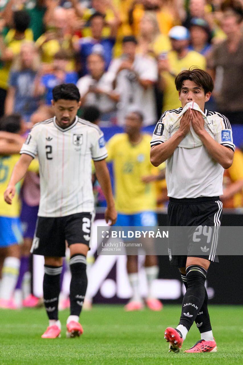 Kaishu Sano of Japan looks dejected