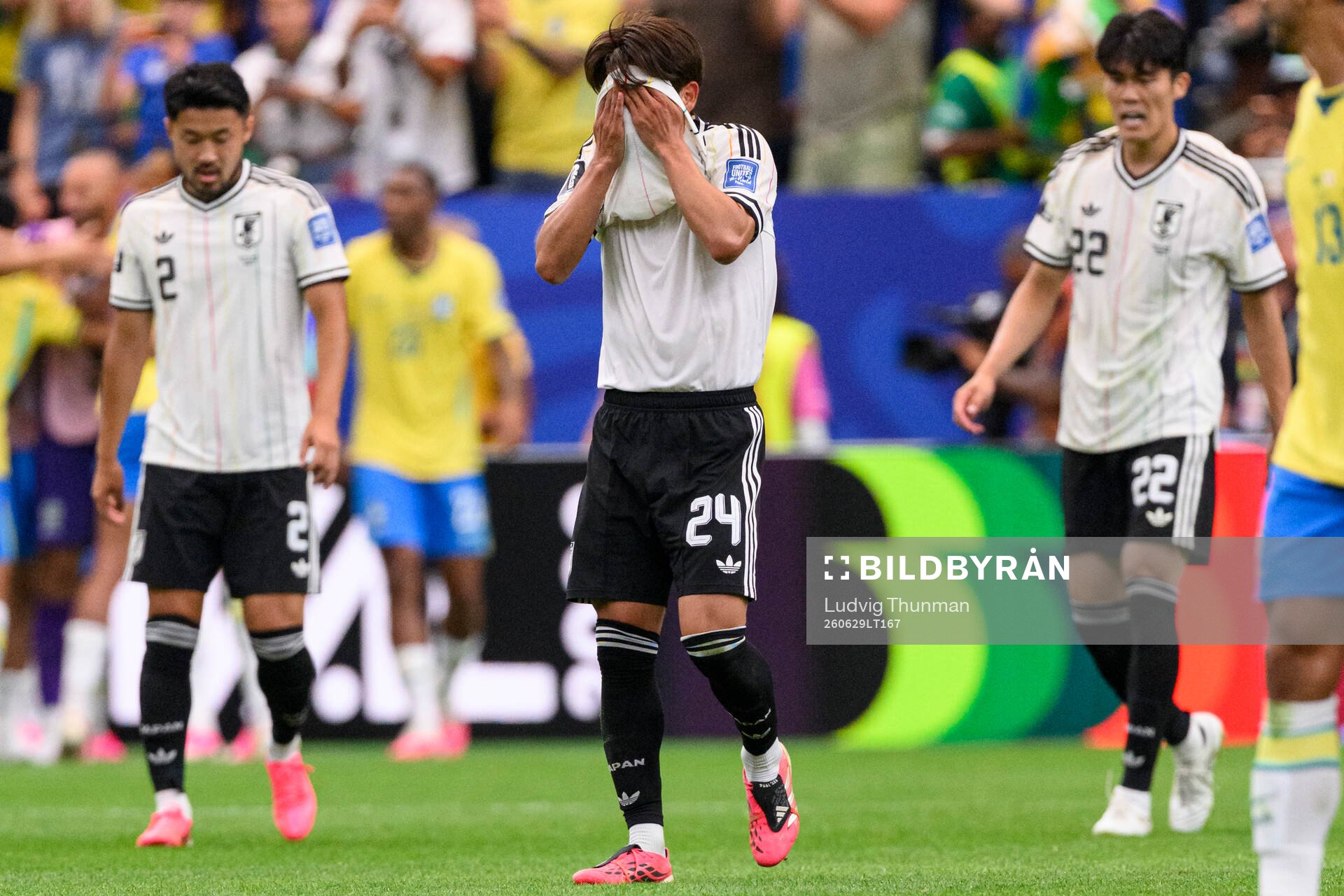 Kaishu Sano of Japan looks dejected