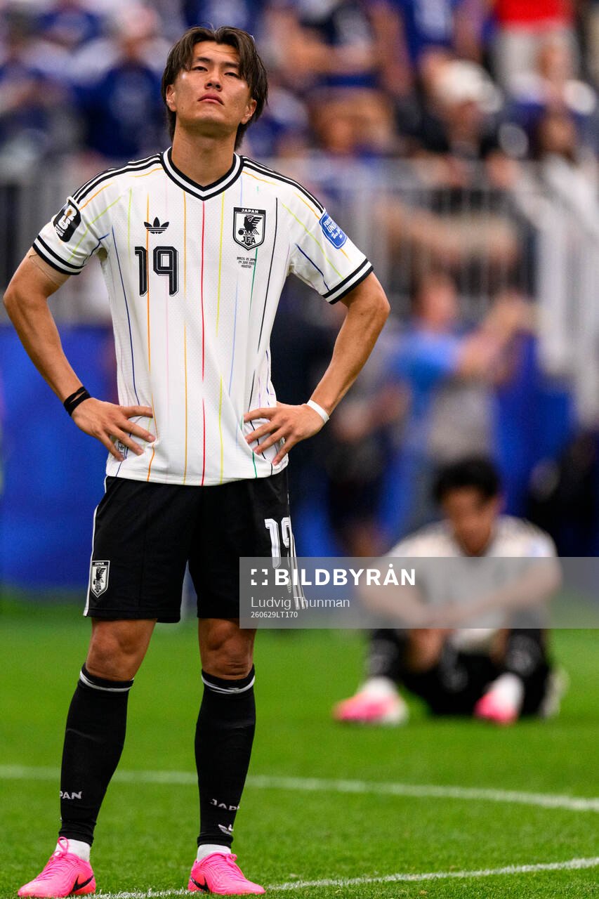 Koki Ogawa of Japan looks dejected