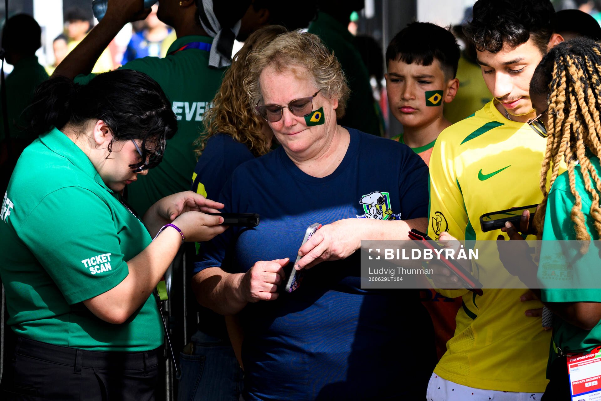 Supporters of Brazil get’s their tickets scanned