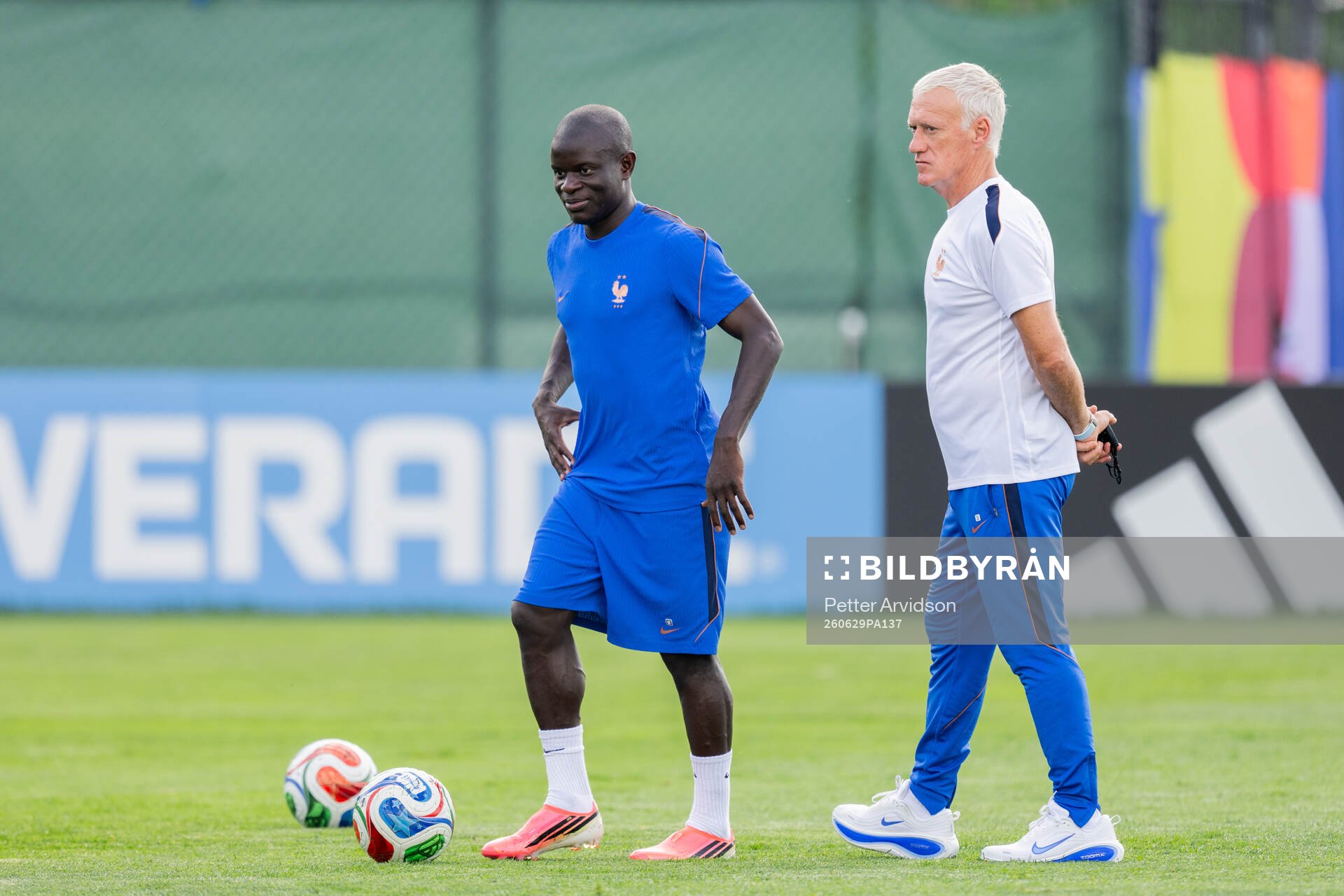 N'Golo Kanté and head coach Didier Deschamps of the French
