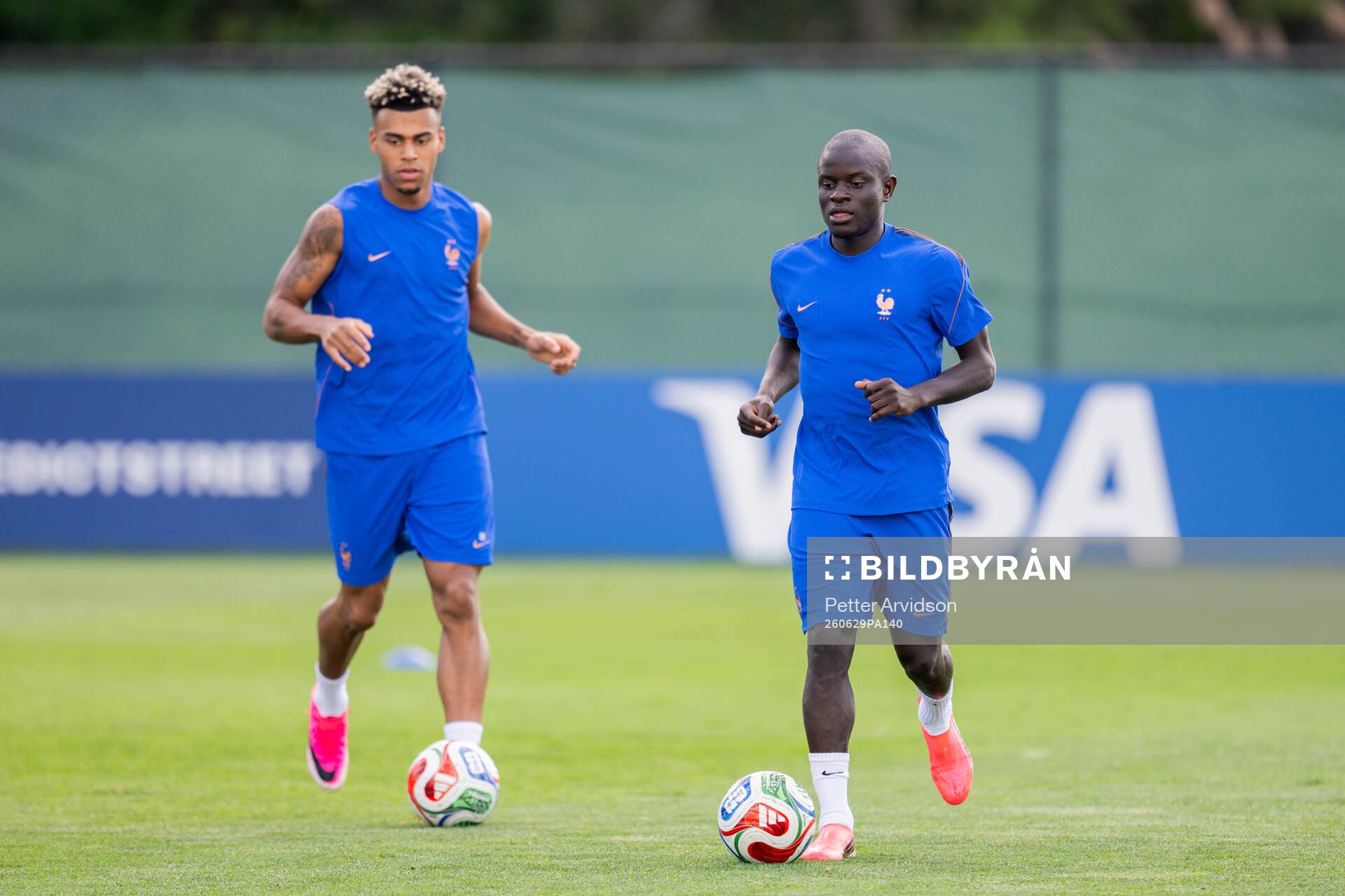 Désiré Doué and N'Golo Kanté of the French national