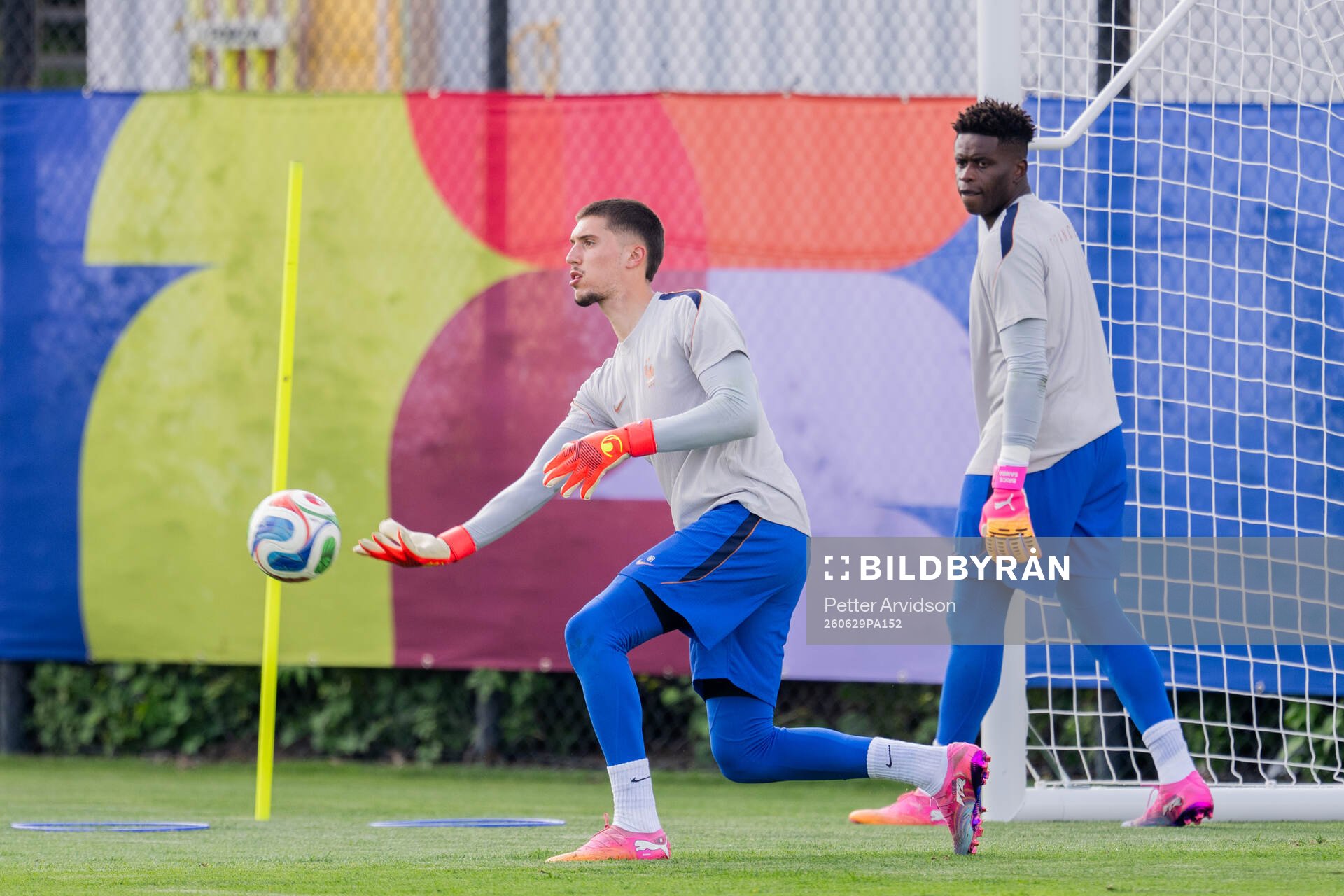 Goalkeeper Robin Risser and goalkeeper Brice Samba of the