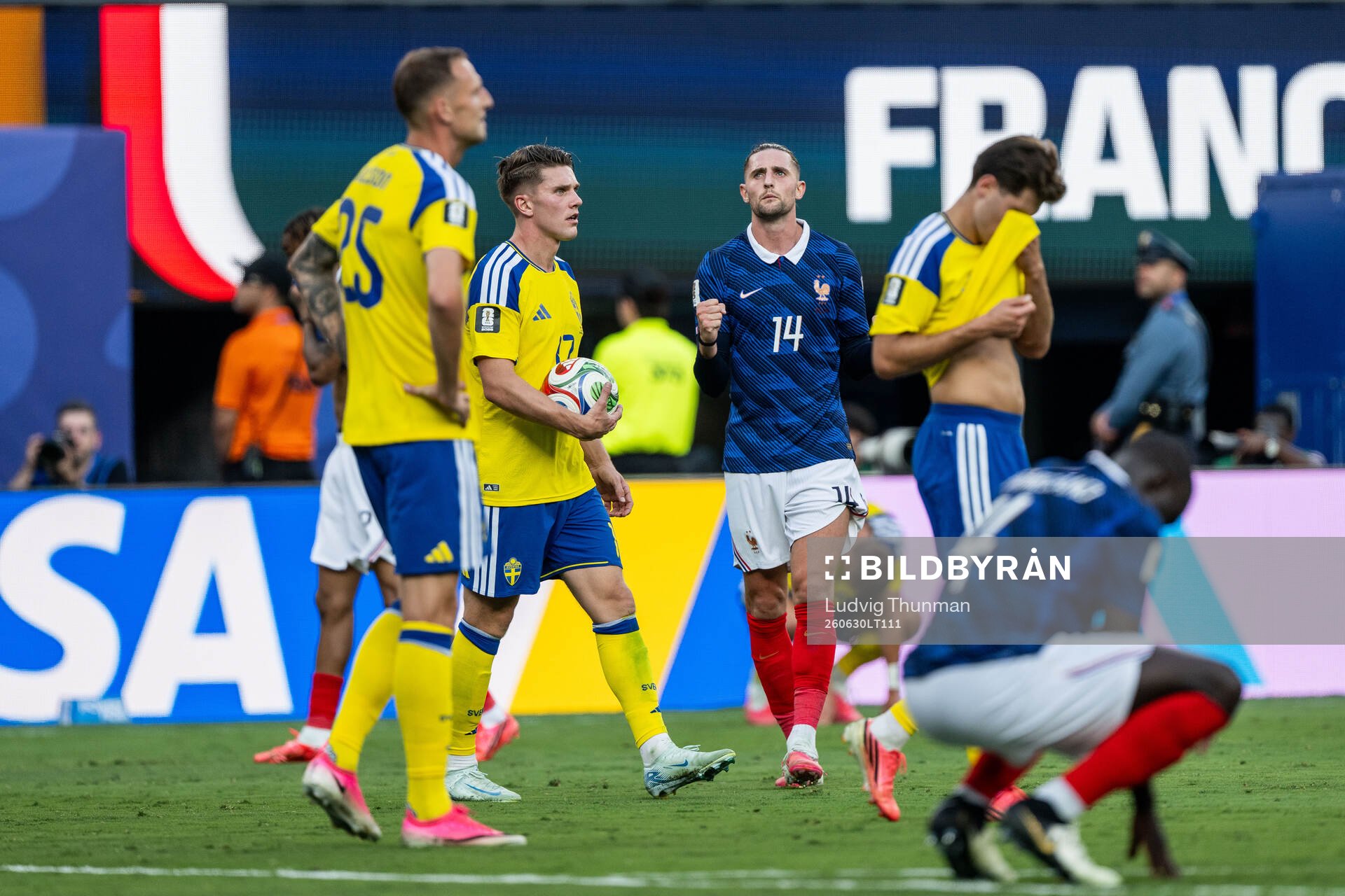 Viktor Gyökeres of Sweden looks dejected and Adrien Rabiot