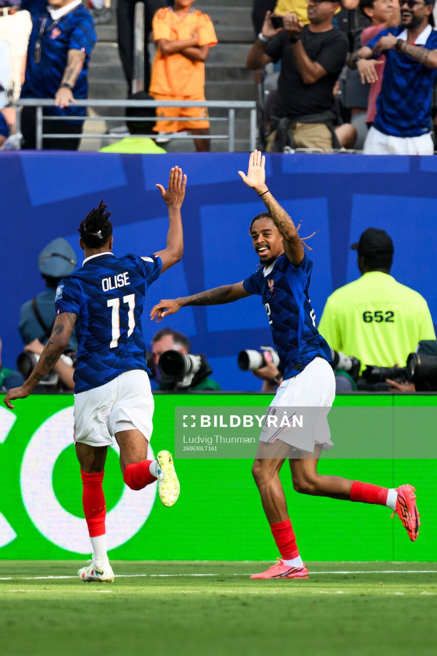 Michael Oliseand Malo Gusto of France celebrates 3-0