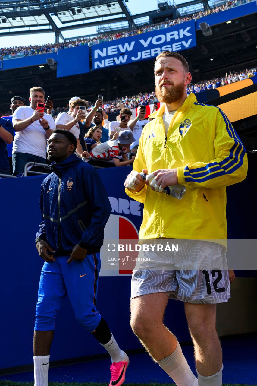 Goalkeeper Viktor Johansson of Sweden enters the pitch