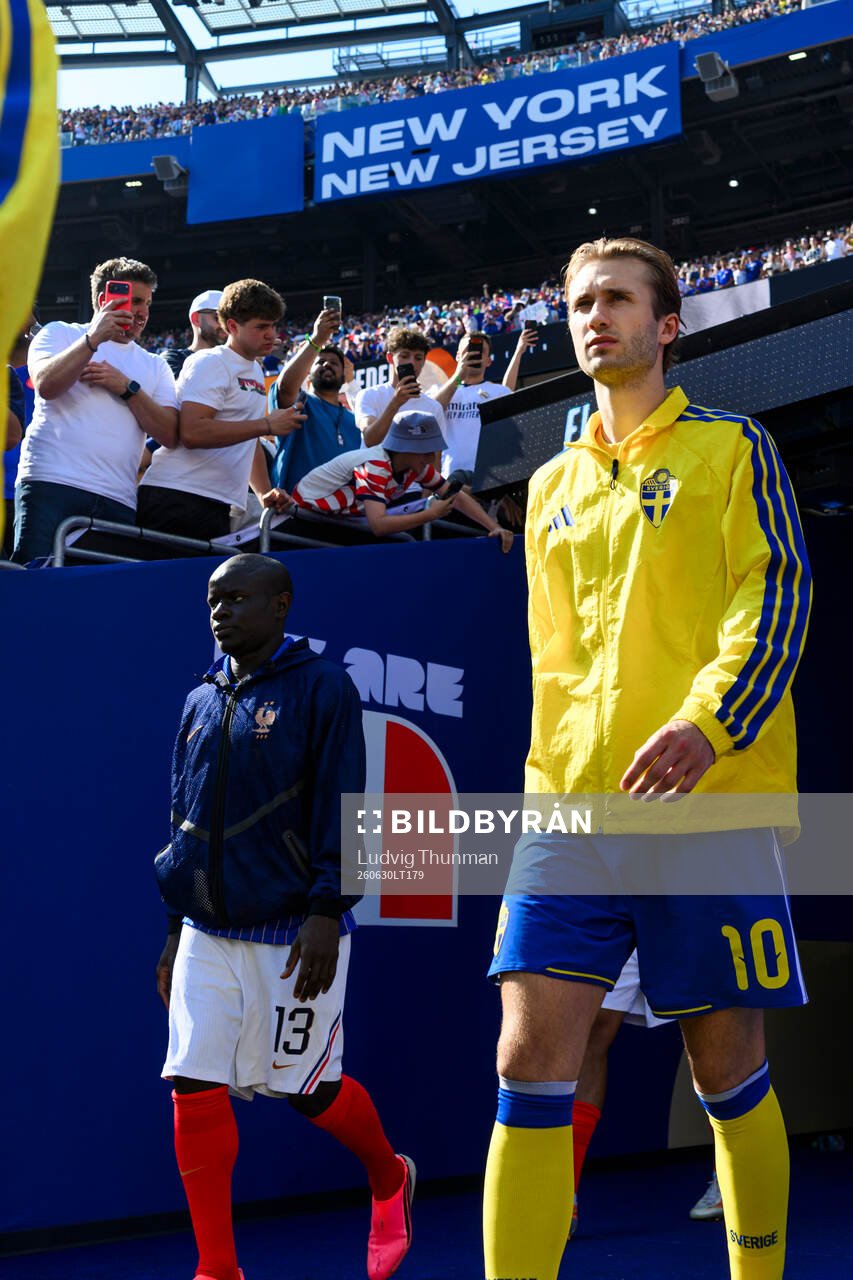 Benjamin Nygren of Sweden enters the pitch