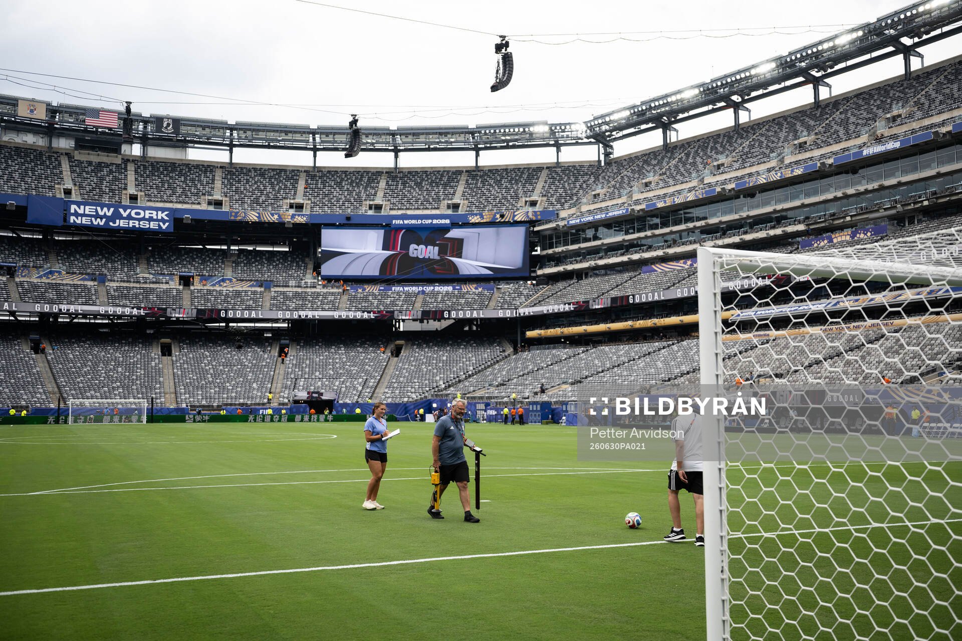 Staff observing the pitch at New York New Jersey Arena