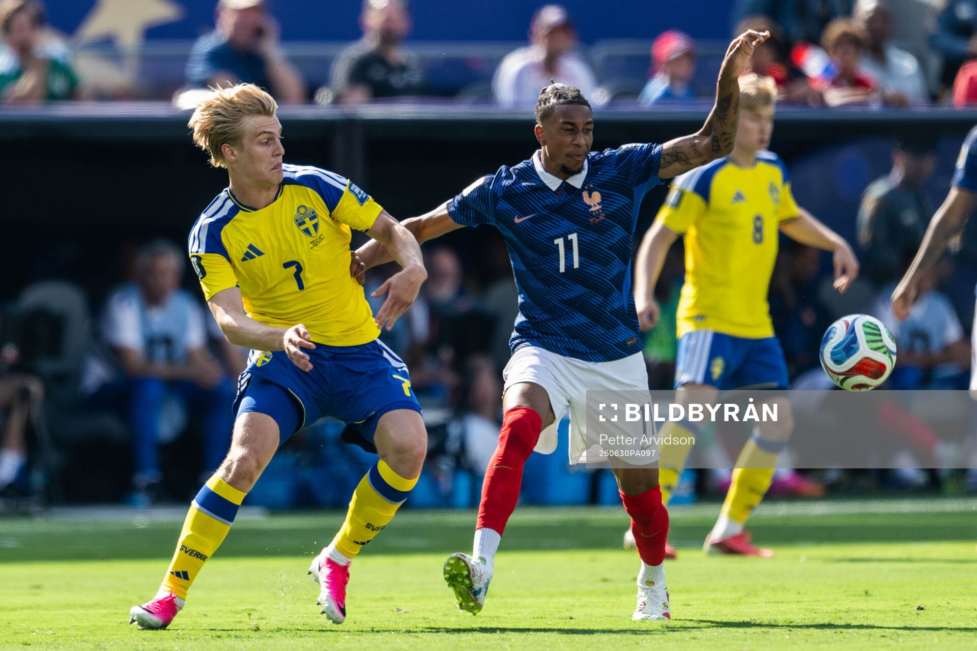 Lucas Bergvall of Sweden and Michael Olise of France uring